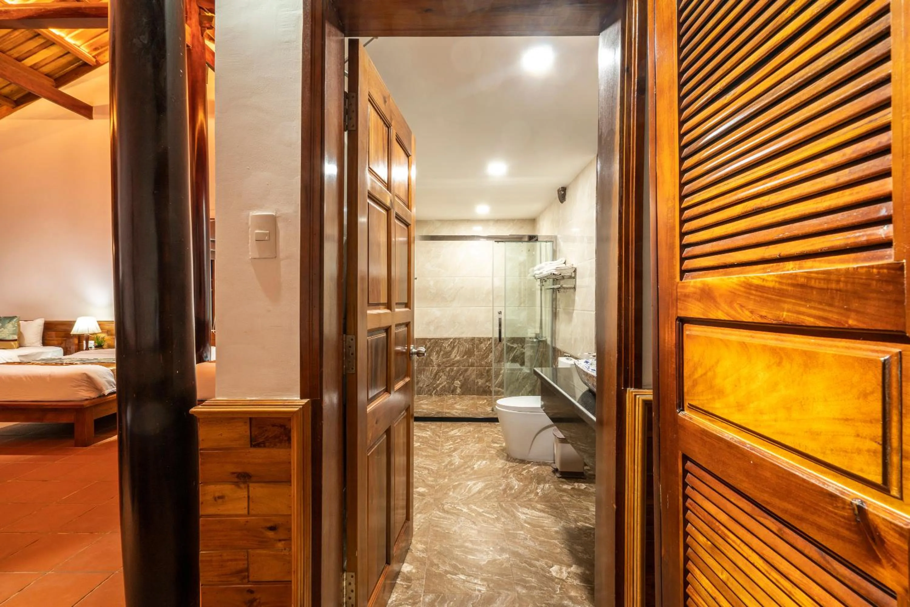 Shower, Bed in Maison Du VietNam Resort & Spa
