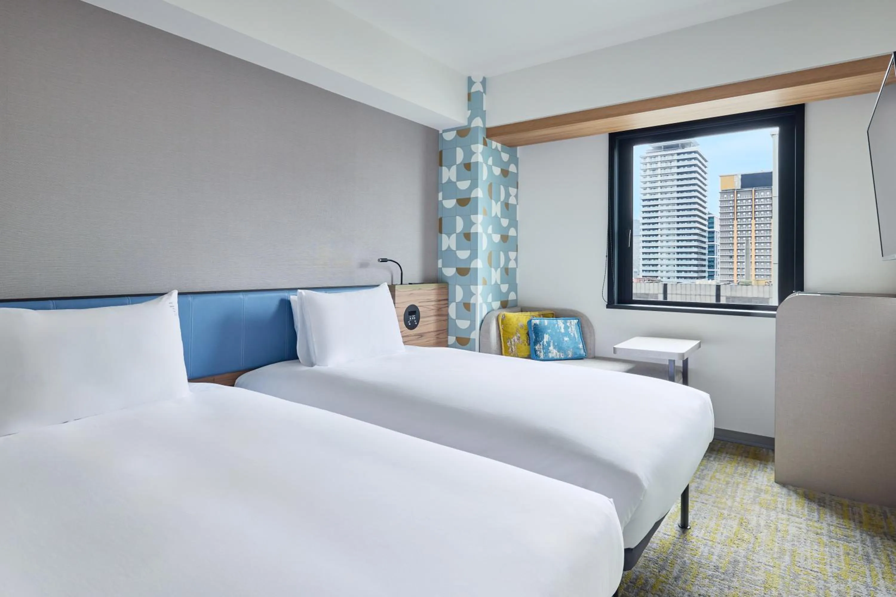 Bed in Holiday Inn Express Osaka City Centre- Midosuji by IHG