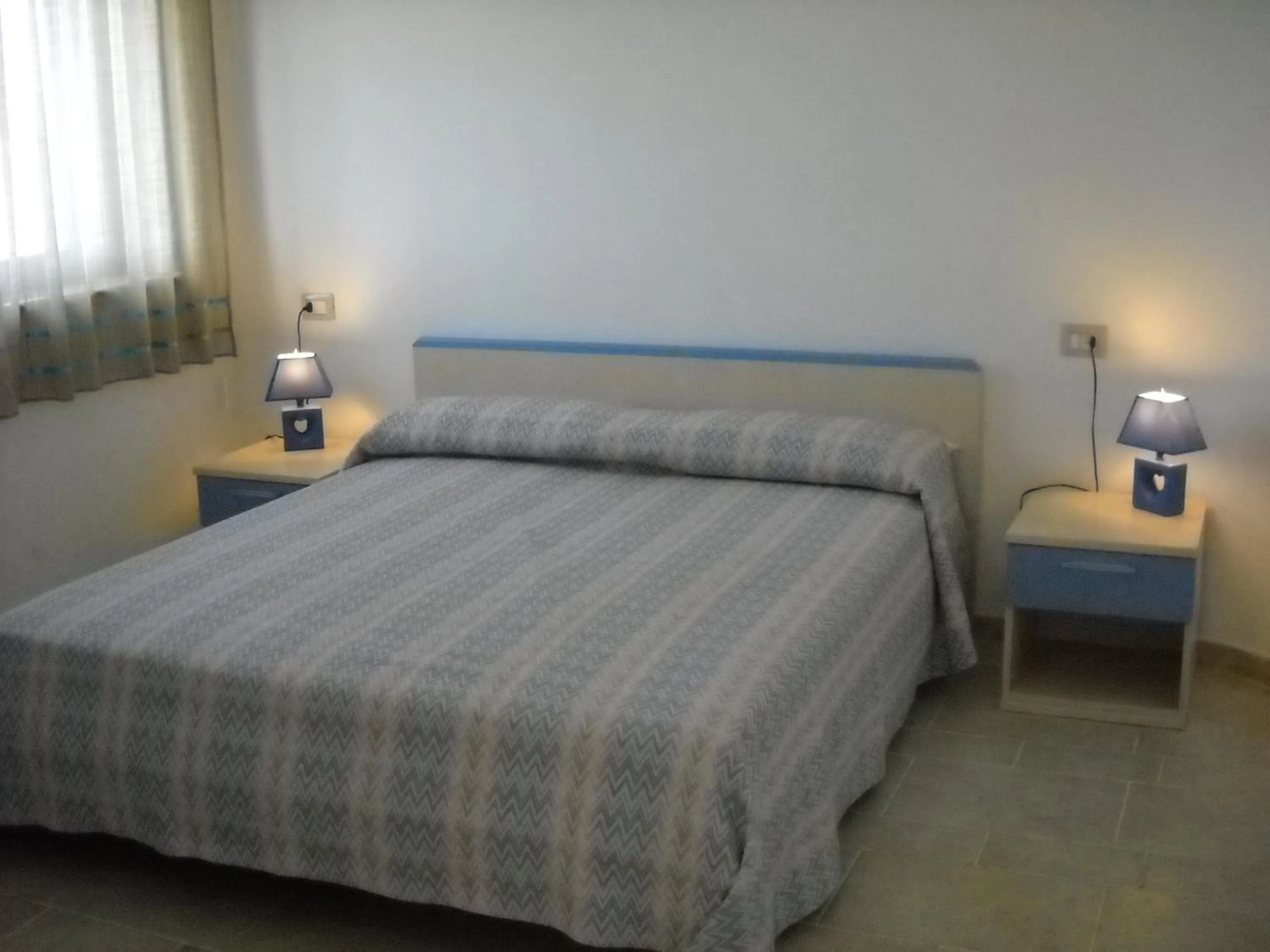 Bed in Zagare Residence