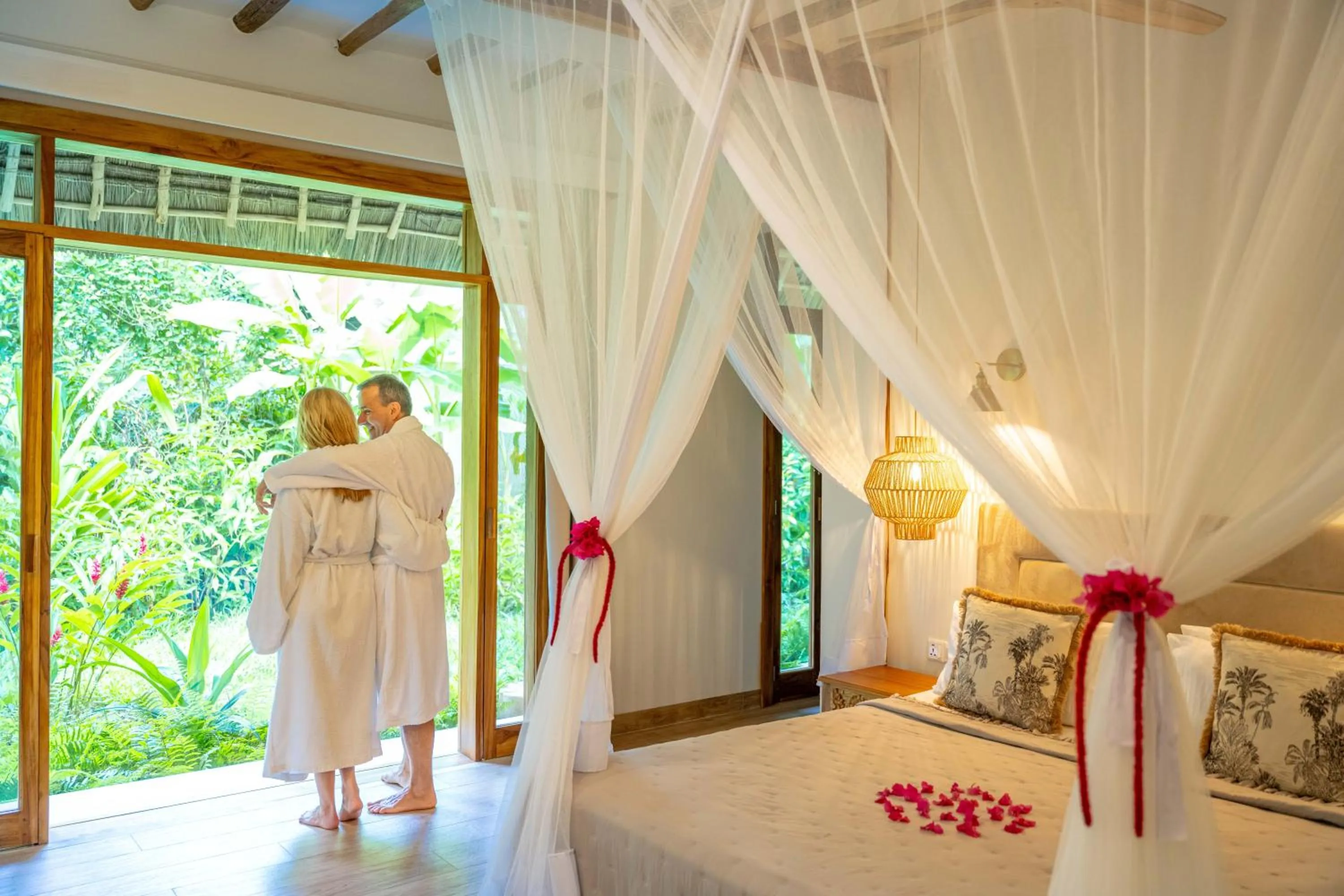 Bed in Zanzi Resort Private Paradise