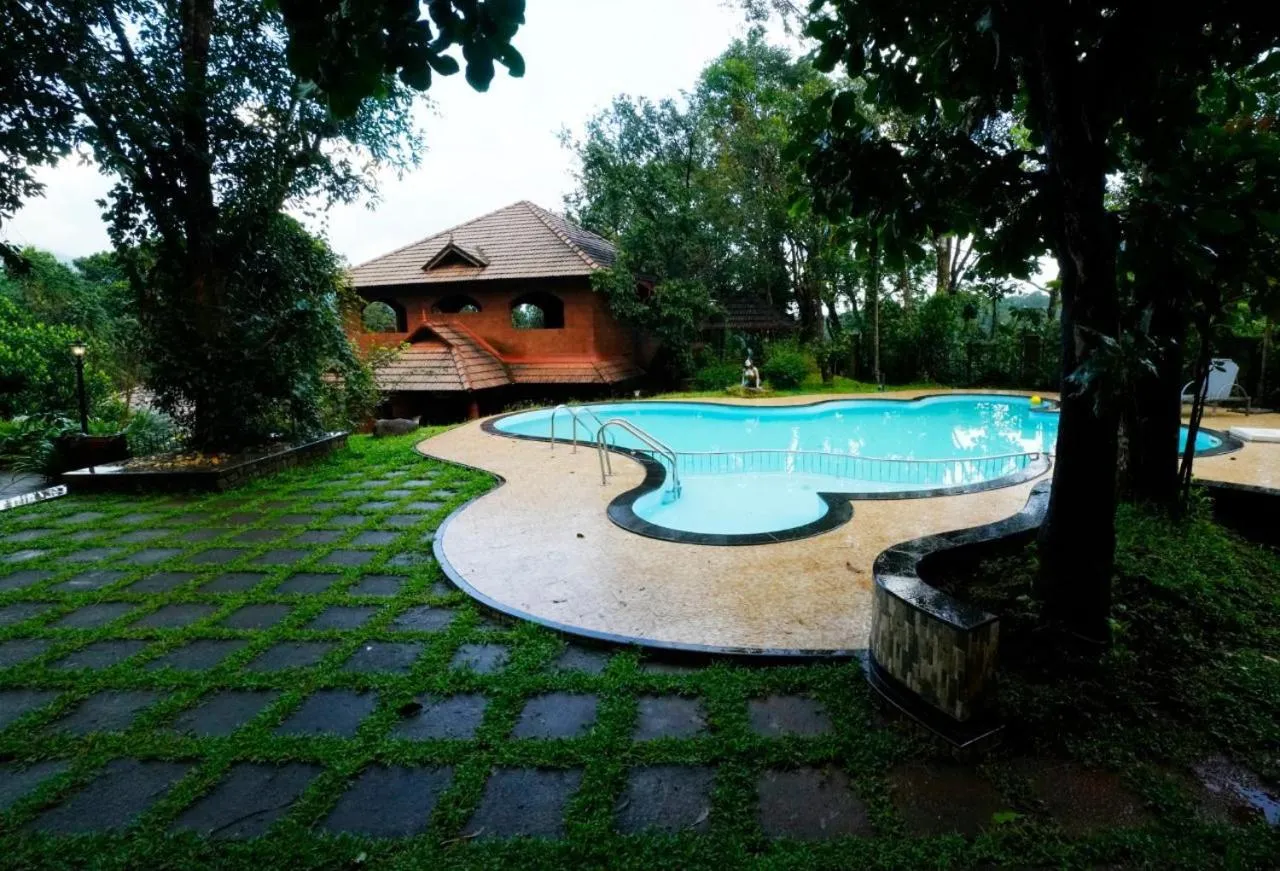 Swimming pool in Indeevara Luxury Resort and Spa, Wayanad