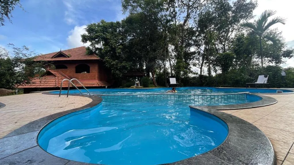 Swimming pool in Indeevara Luxury Resort and Spa, Wayanad