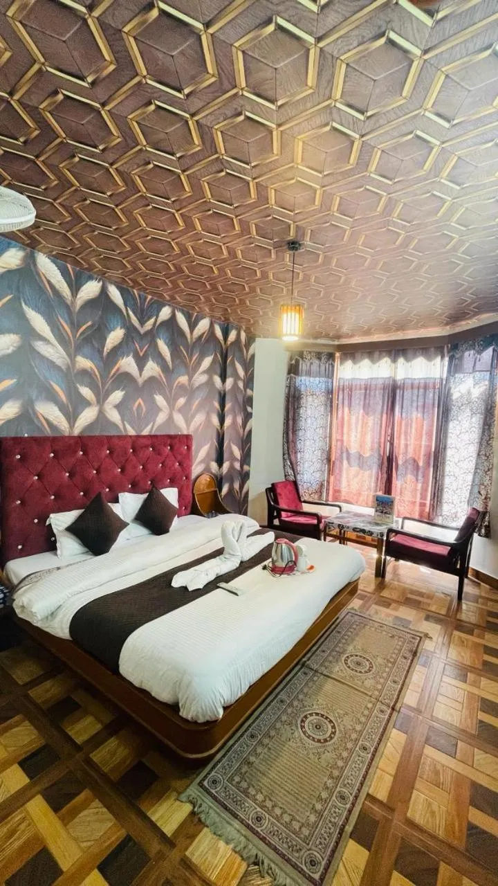 Bed in Hotel Hilltop At Mall Road Manali With Open Terrace