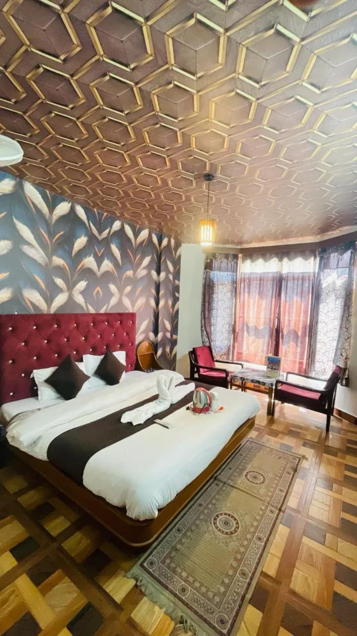 Bed in Hotel Hilltop At Mall Road Manali With Open Terrace