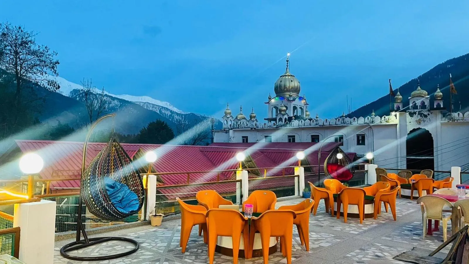 Seating area in Hotel Hilltop At Mall Road Manali With Open Terrace