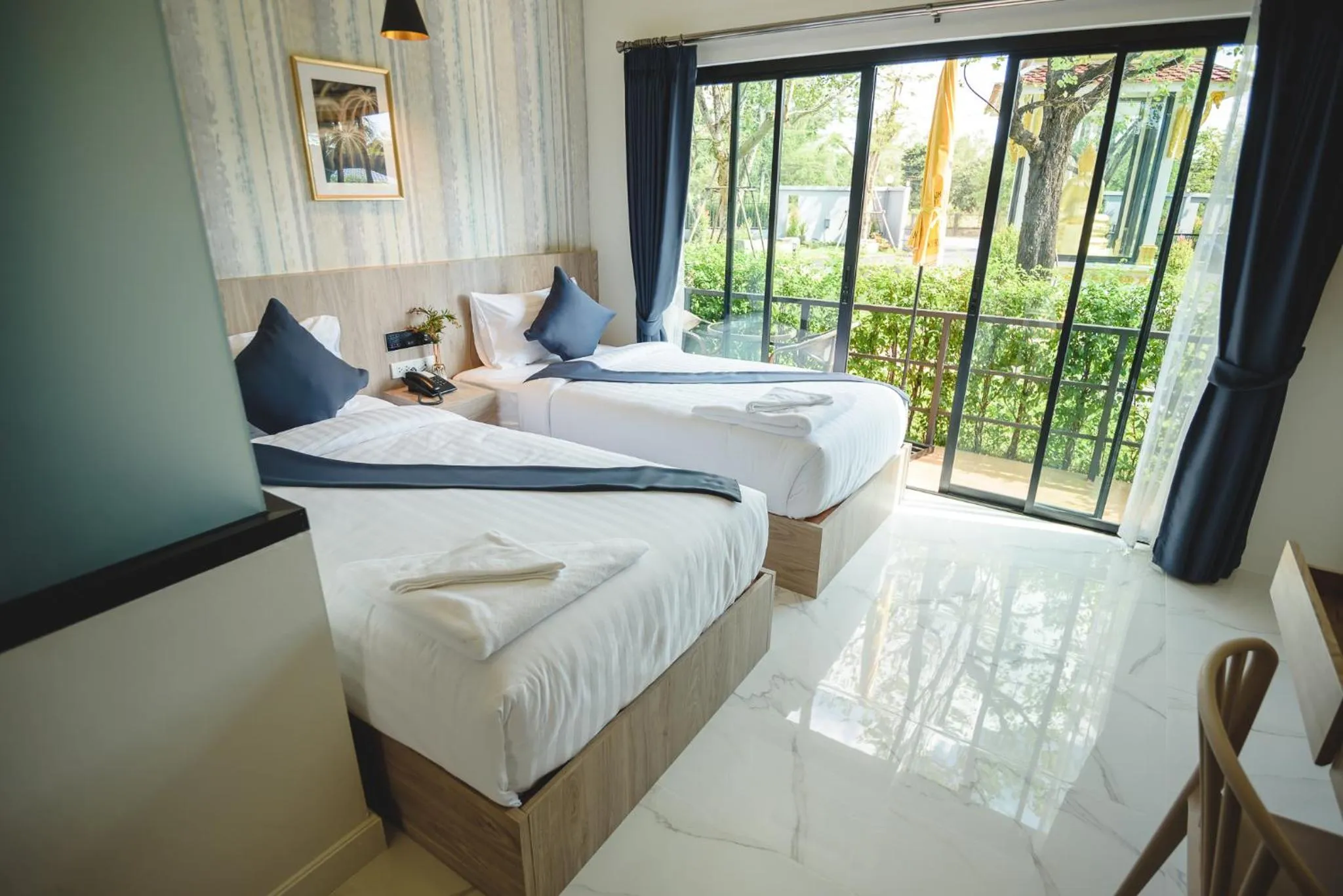 Bed in Phuengluang Riverside Hotel Chanthaburi