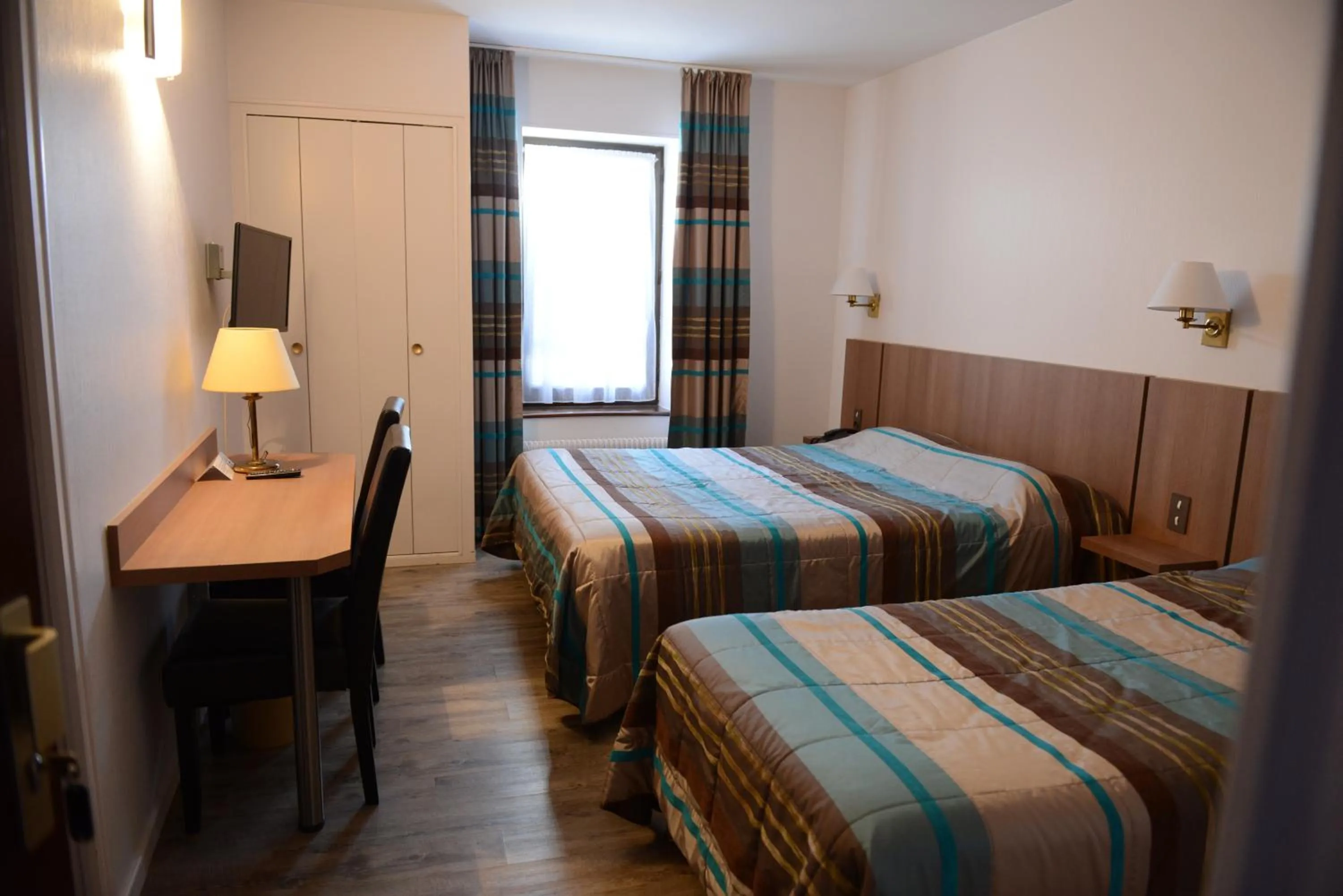 Photo of the whole room, Bed in Hôtel du Lion