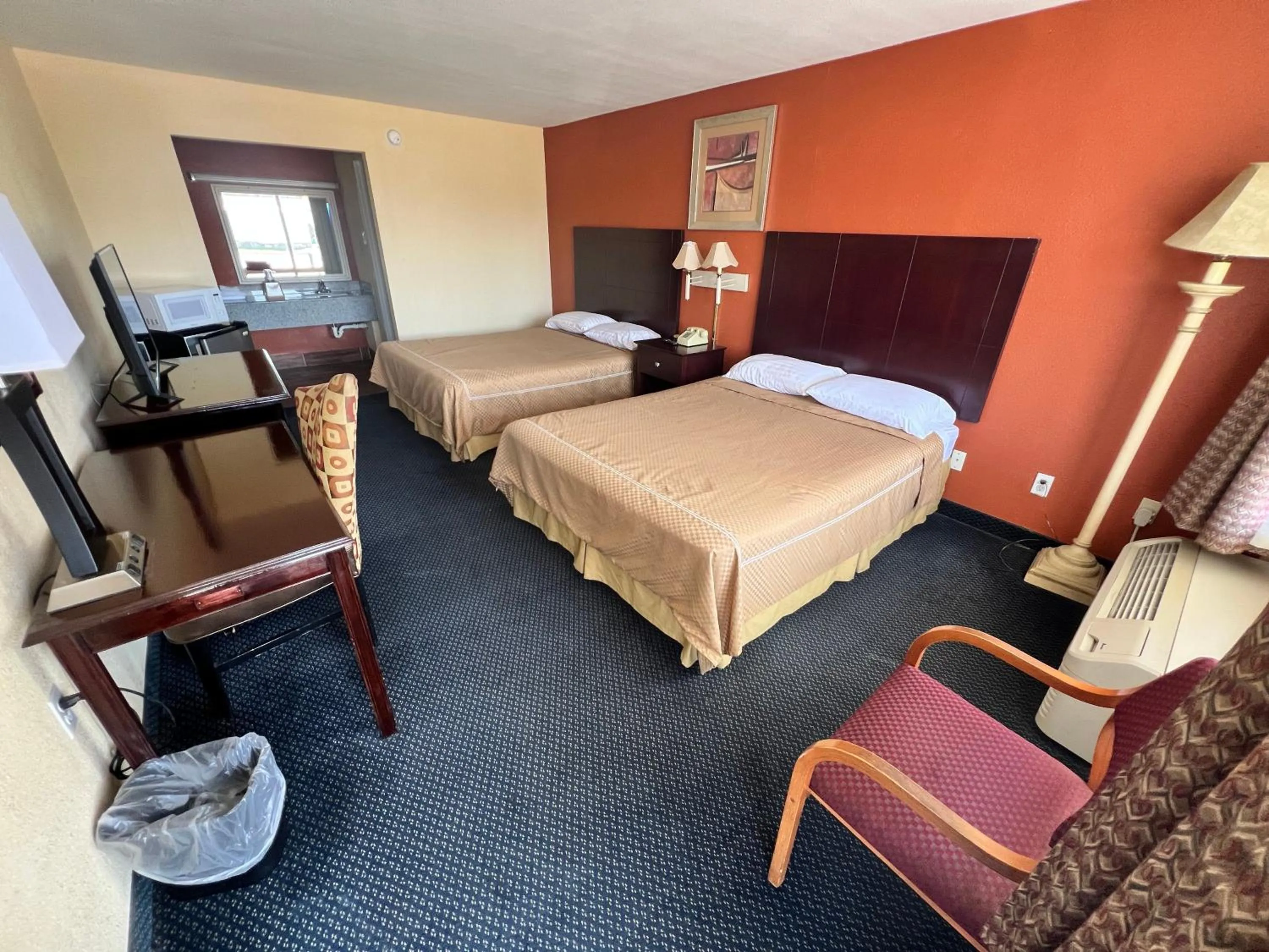 Bed in Executive Inn Texarkana