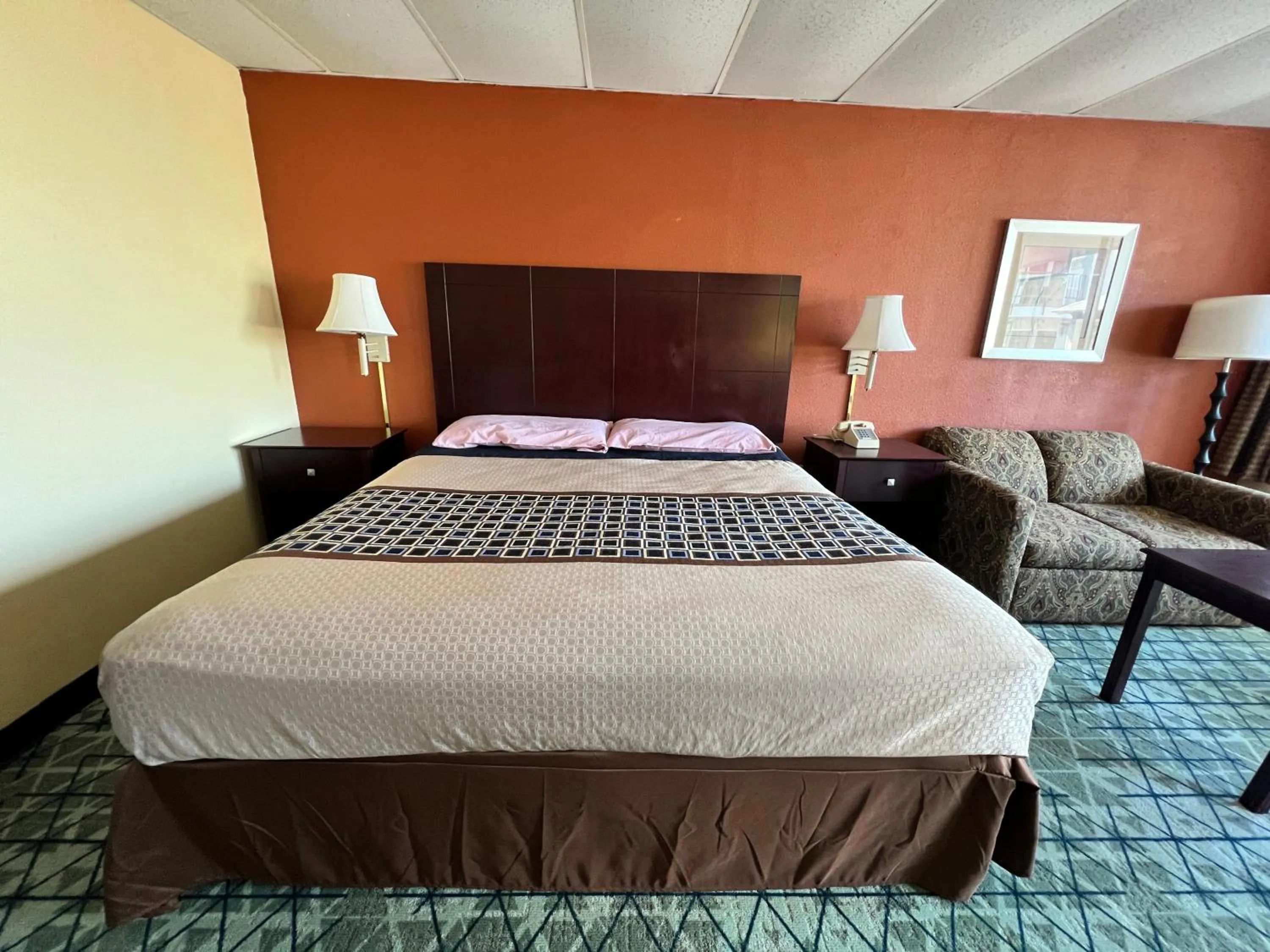 Bed in Executive Inn Texarkana