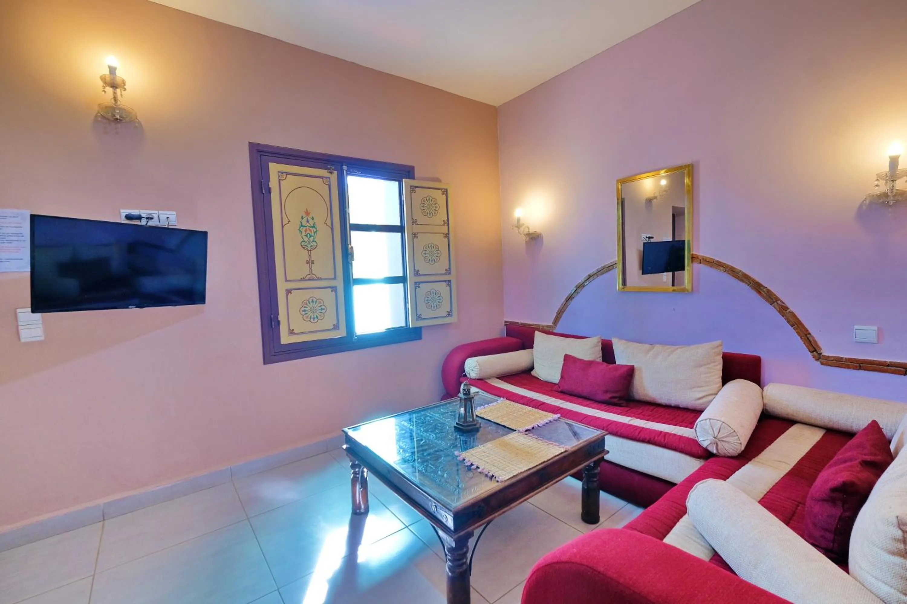 Communal lounge/ TV room in Hacienda Marrakech