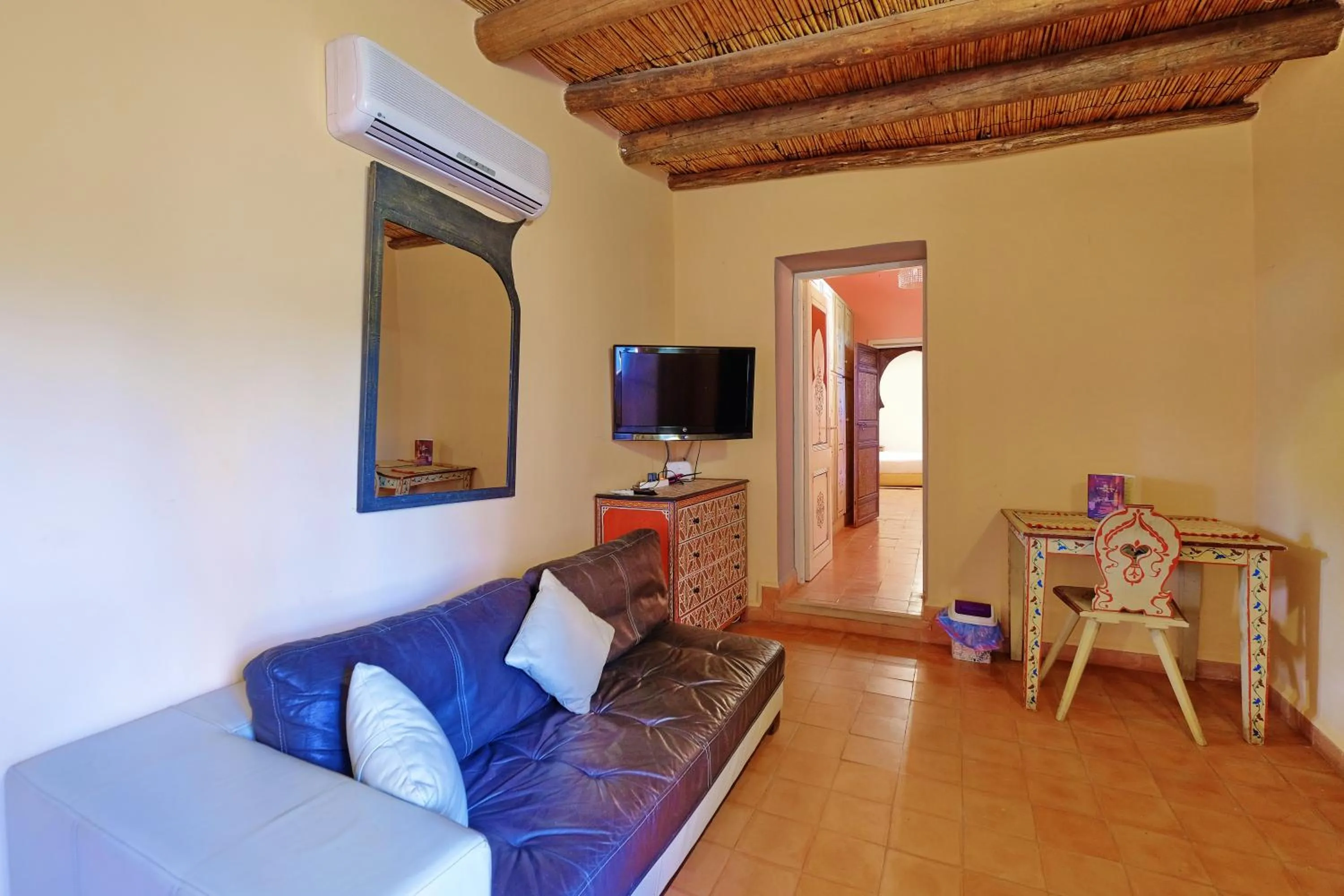 Communal lounge/ TV room in Hacienda Marrakech