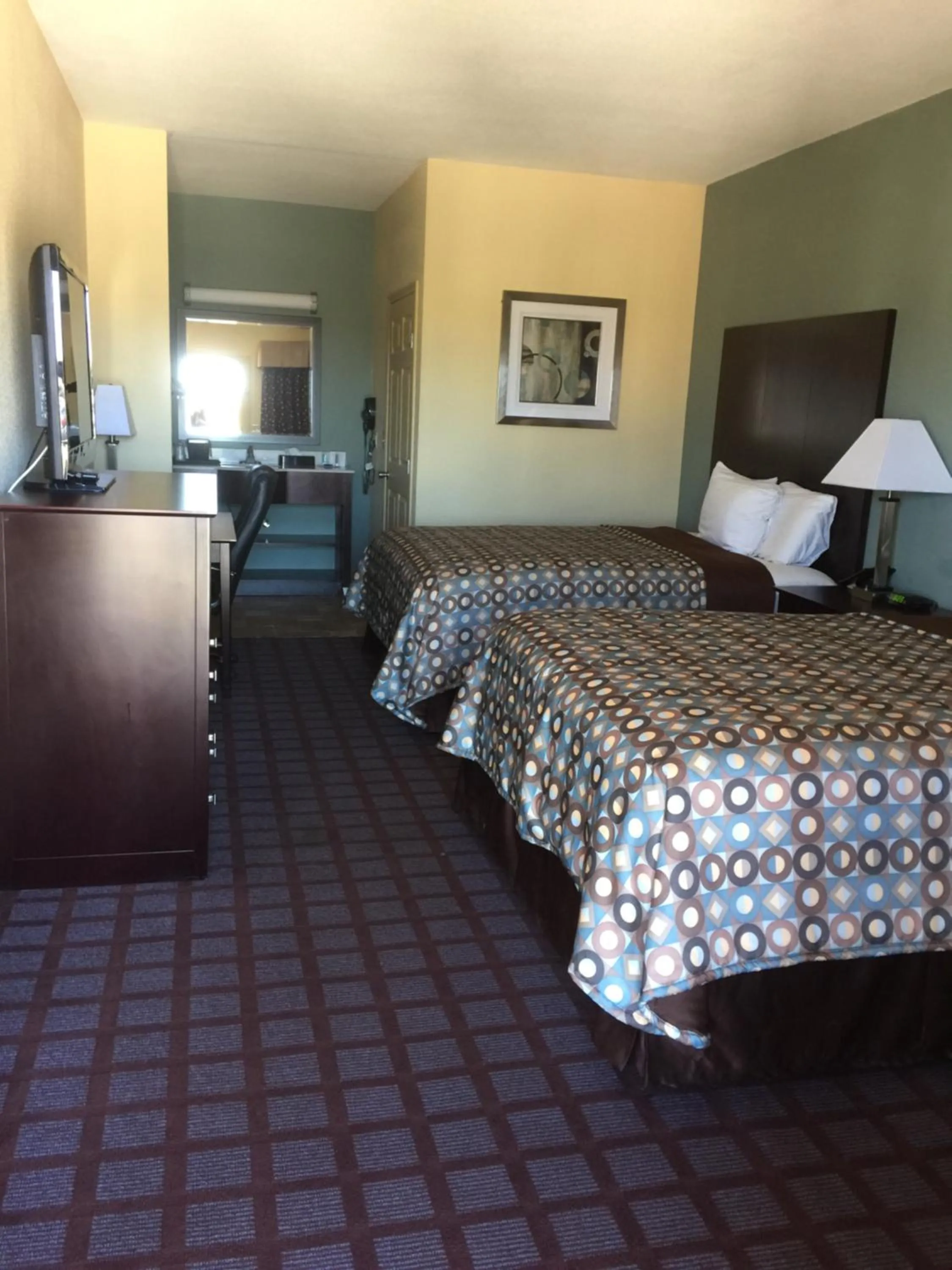 Property building, Bed in Pearsall Inn and Suites