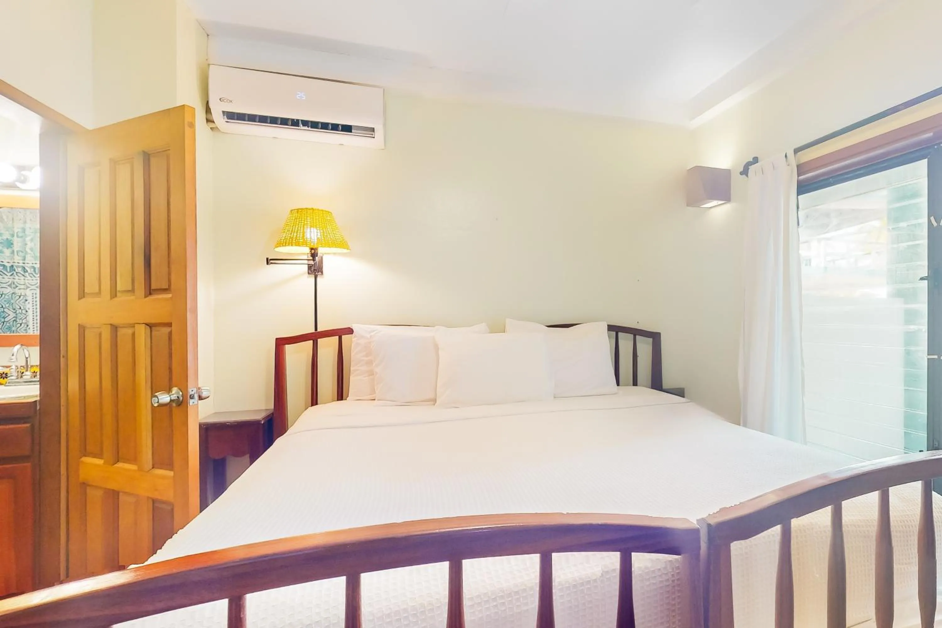 Bed in Condo #25 @ Beachside Villas