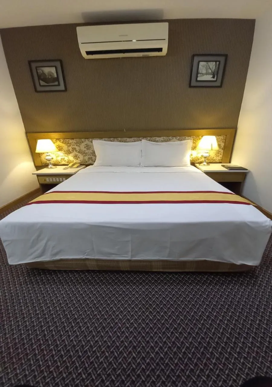 Bed in Khai Hoan Apartment Hotel