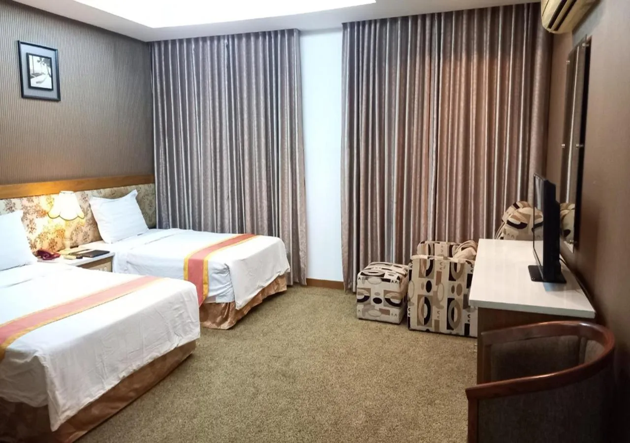 Bed in Khai Hoan Apartment Hotel