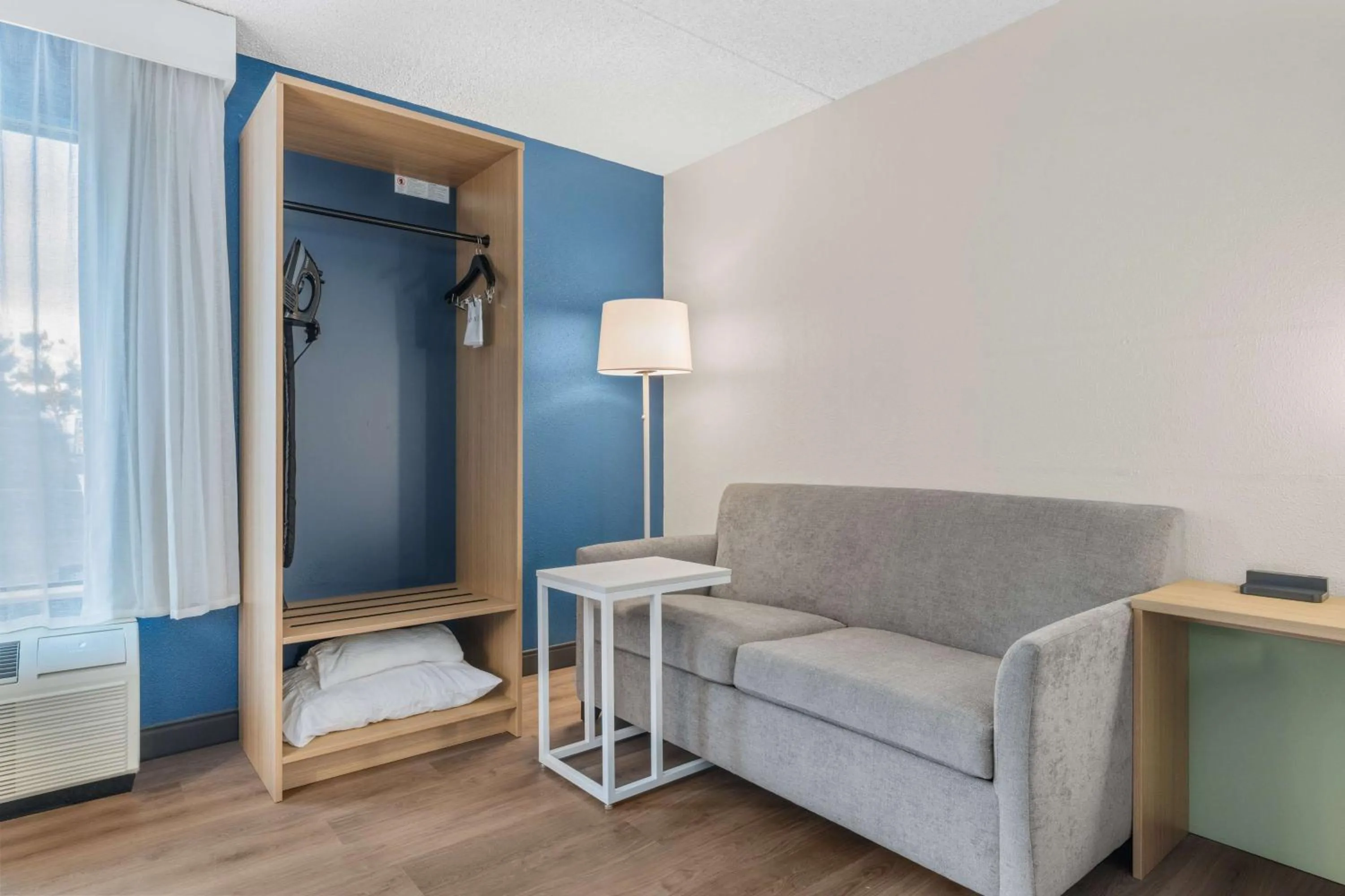 Living room, Bed in Spark by Hilton Colorado Springs I 25 Central