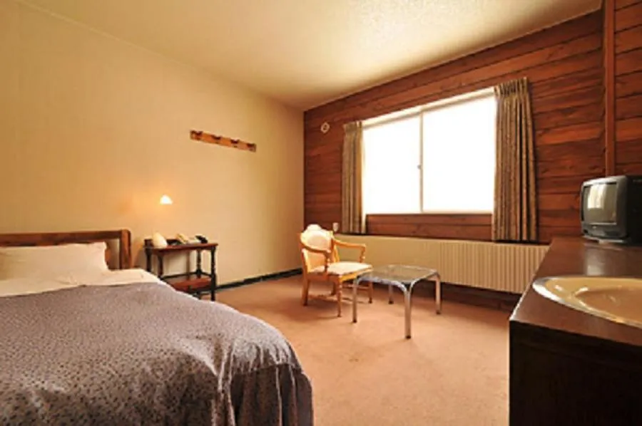 Bed in Hotel Takimoto