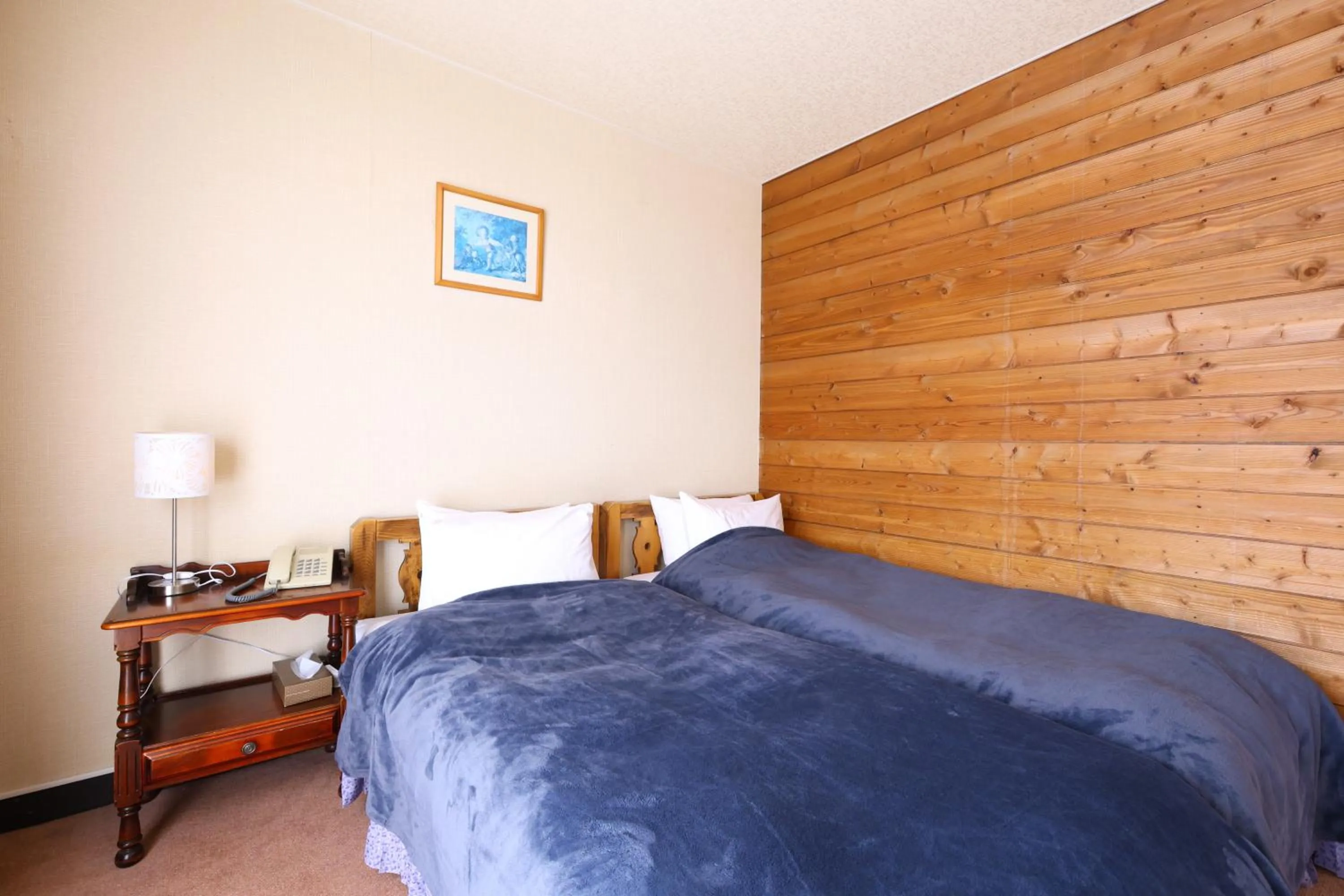 Bed in Hotel Takimoto