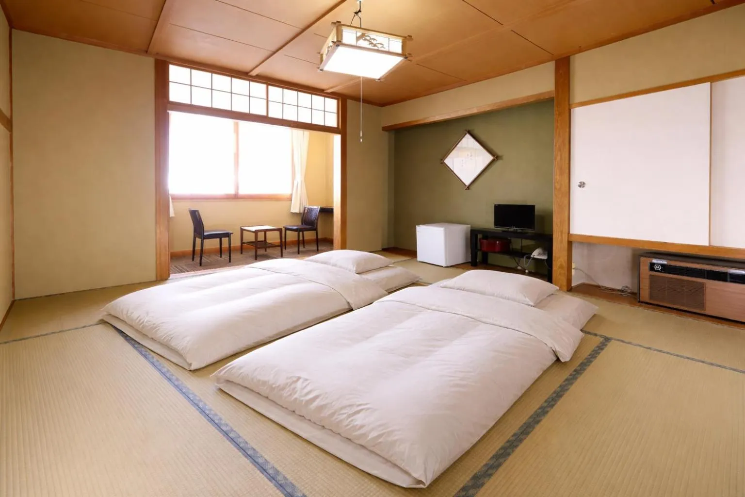 Bed in Hotel Takimoto