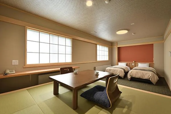 Bed in Hotel Takimoto