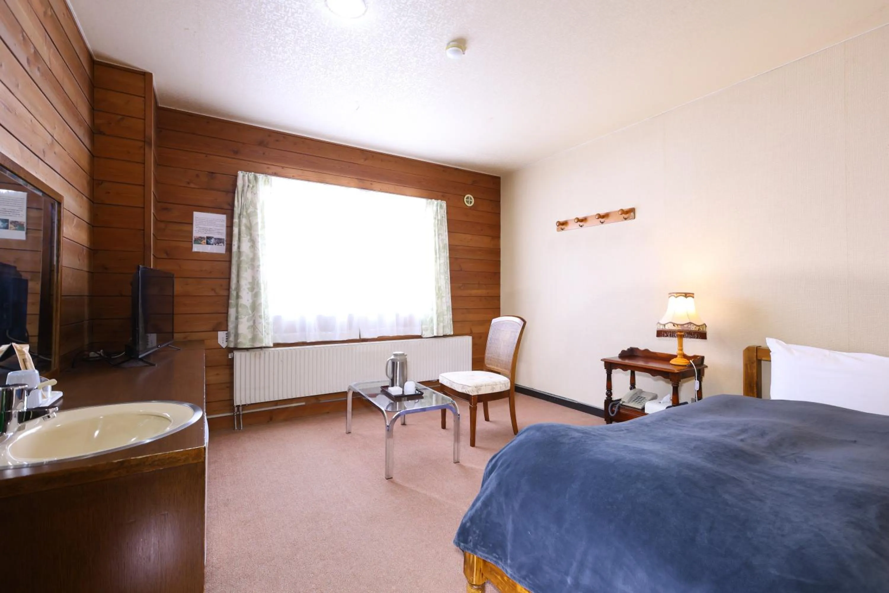 Bed in Hotel Takimoto