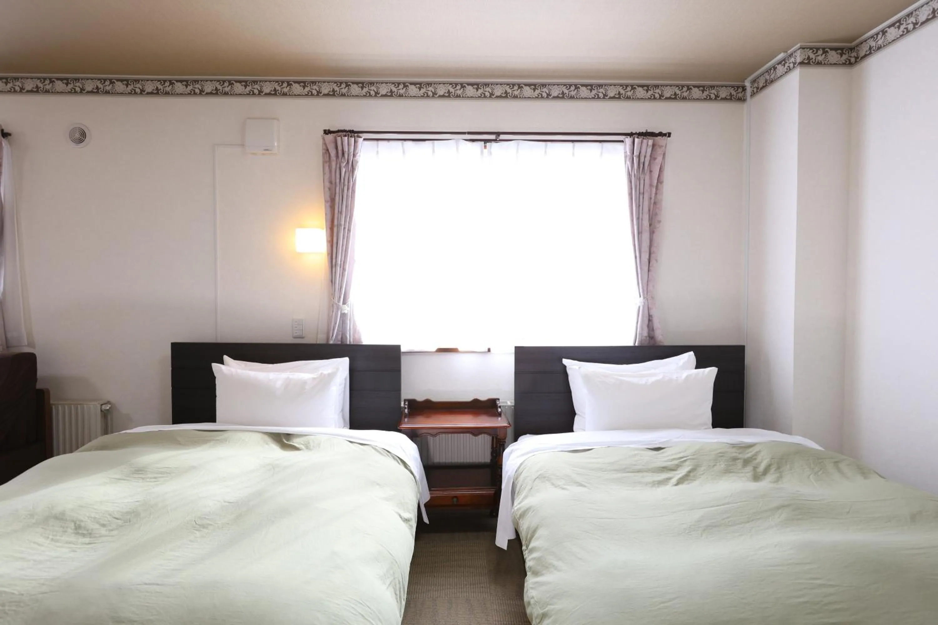 Bed in Hotel Takimoto