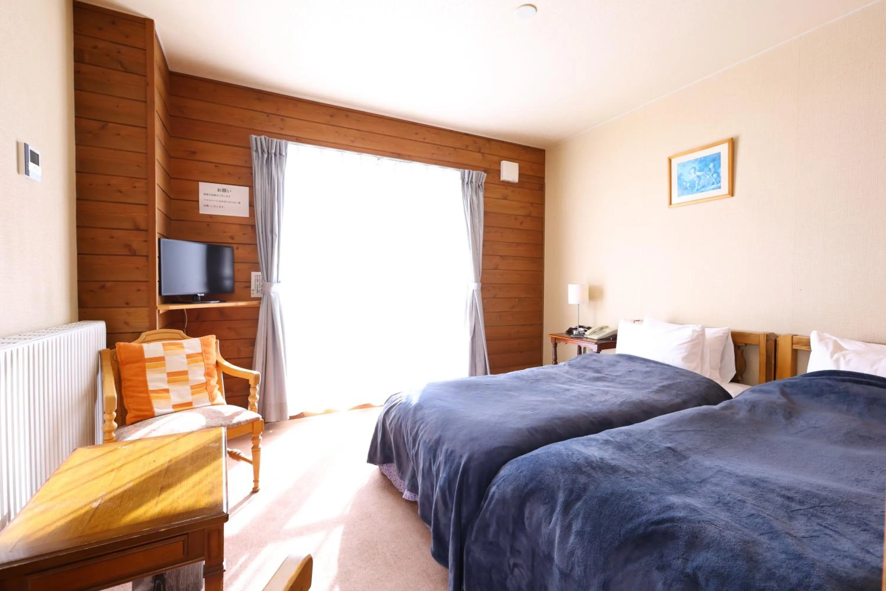 Bed in Hotel Takimoto