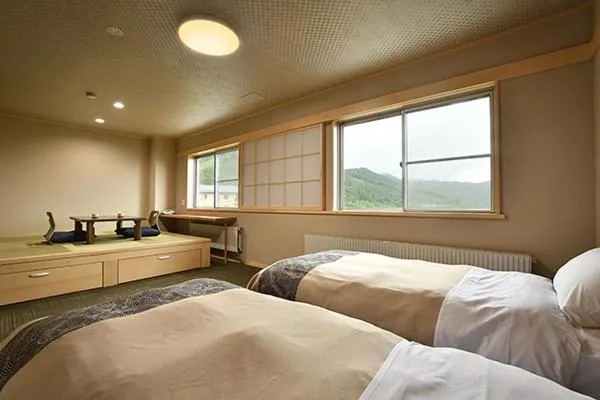 Bed in Hotel Takimoto