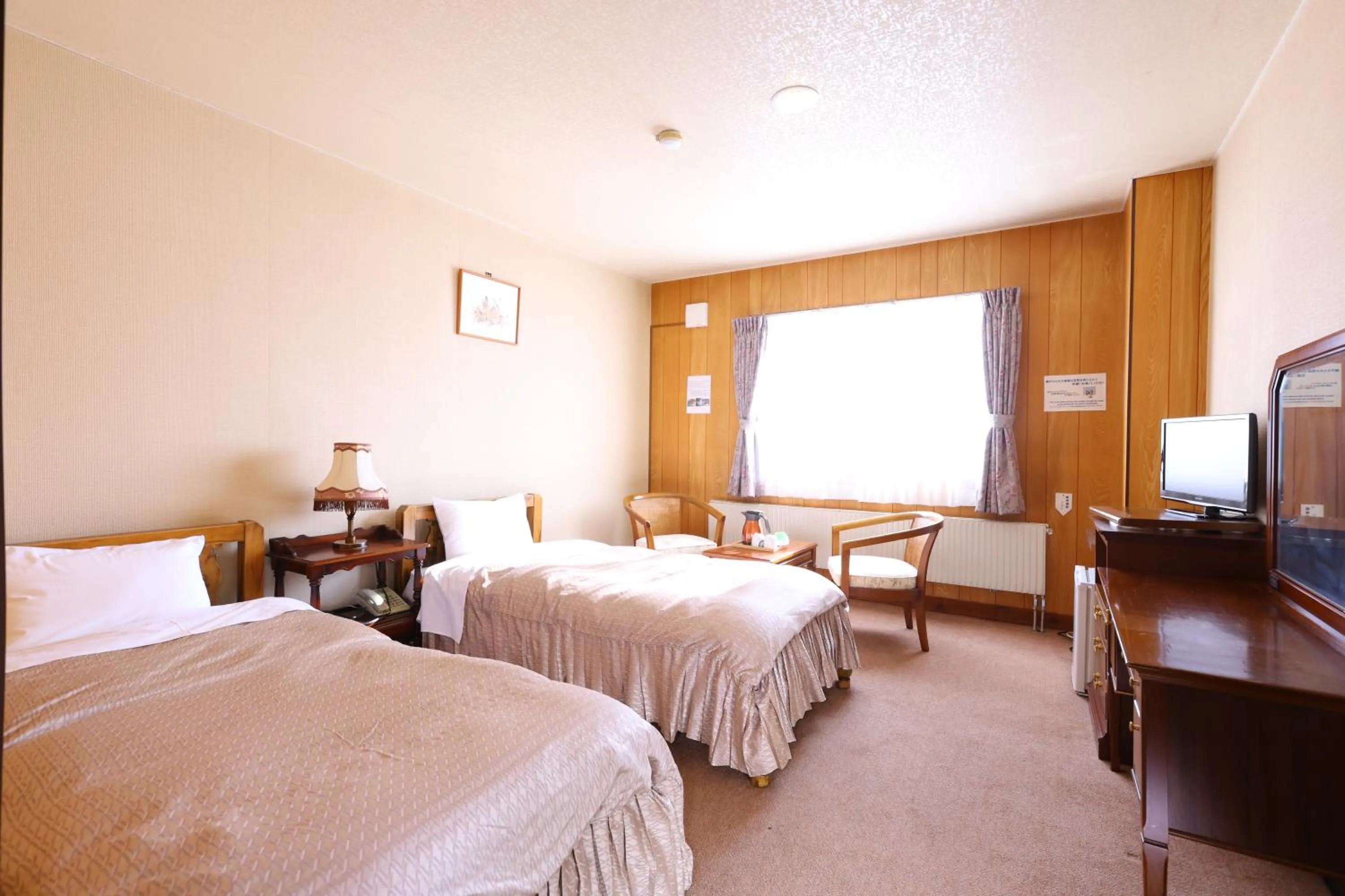 Bed in Hotel Takimoto