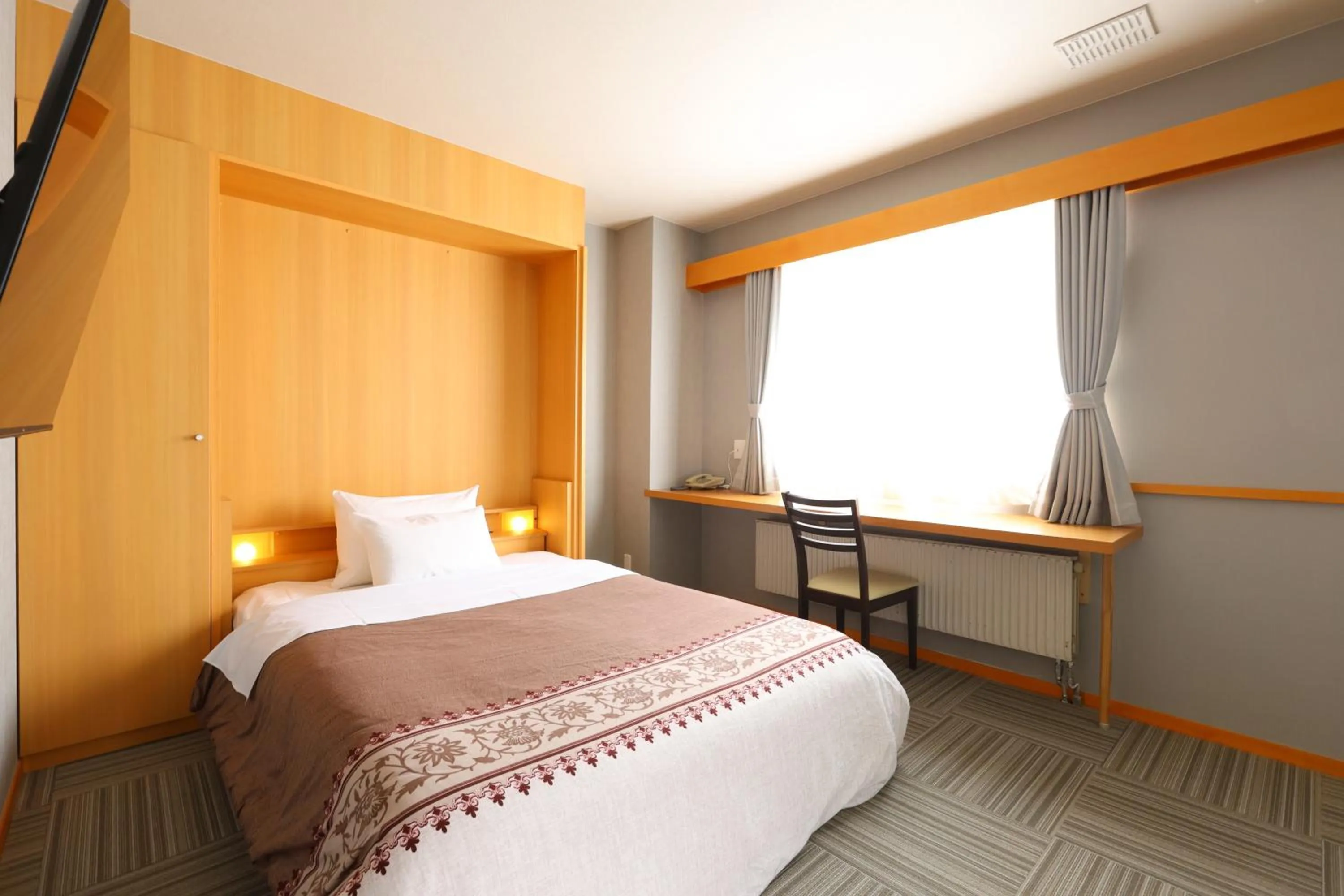 Bed in Hotel Takimoto