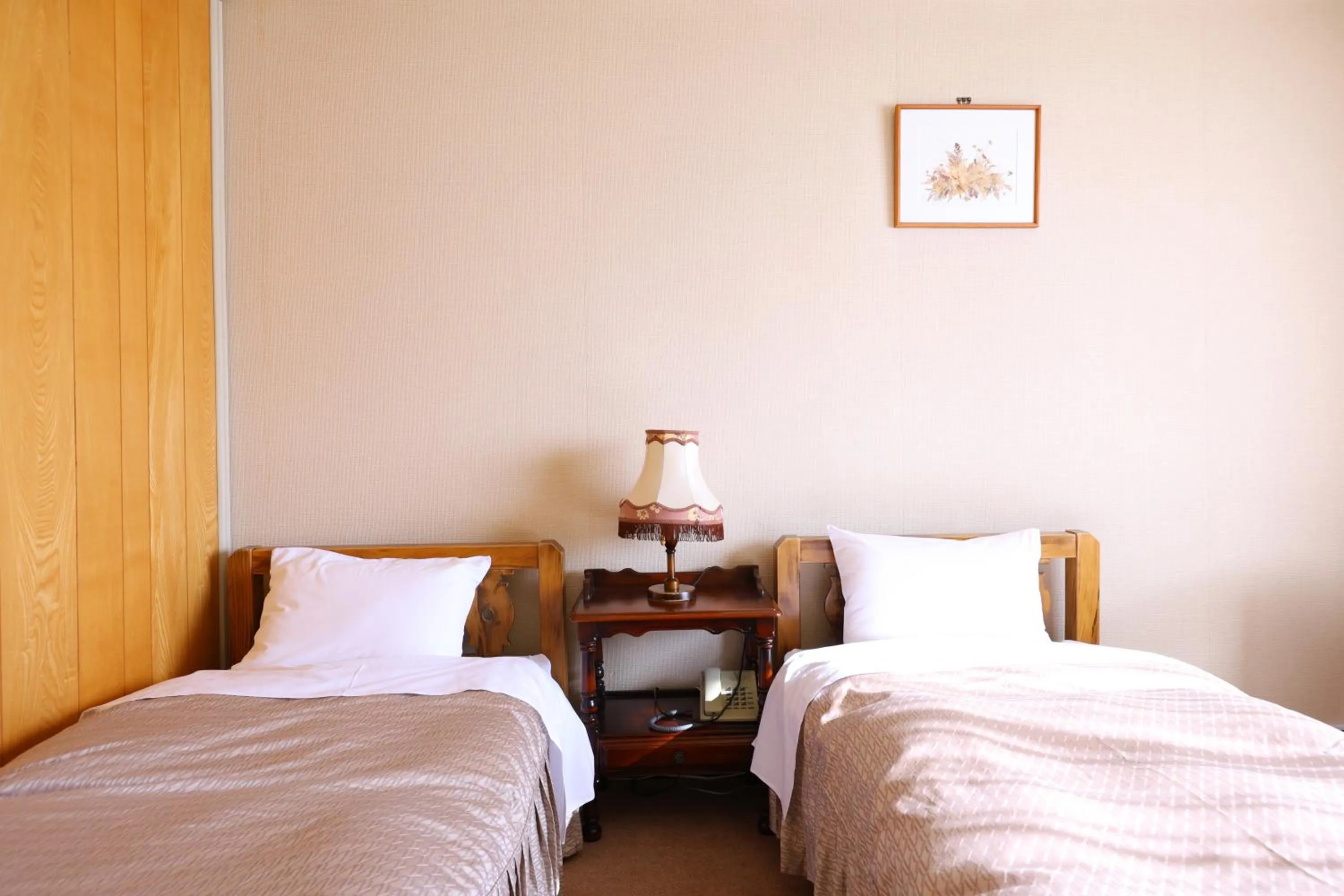 Bed in Hotel Takimoto