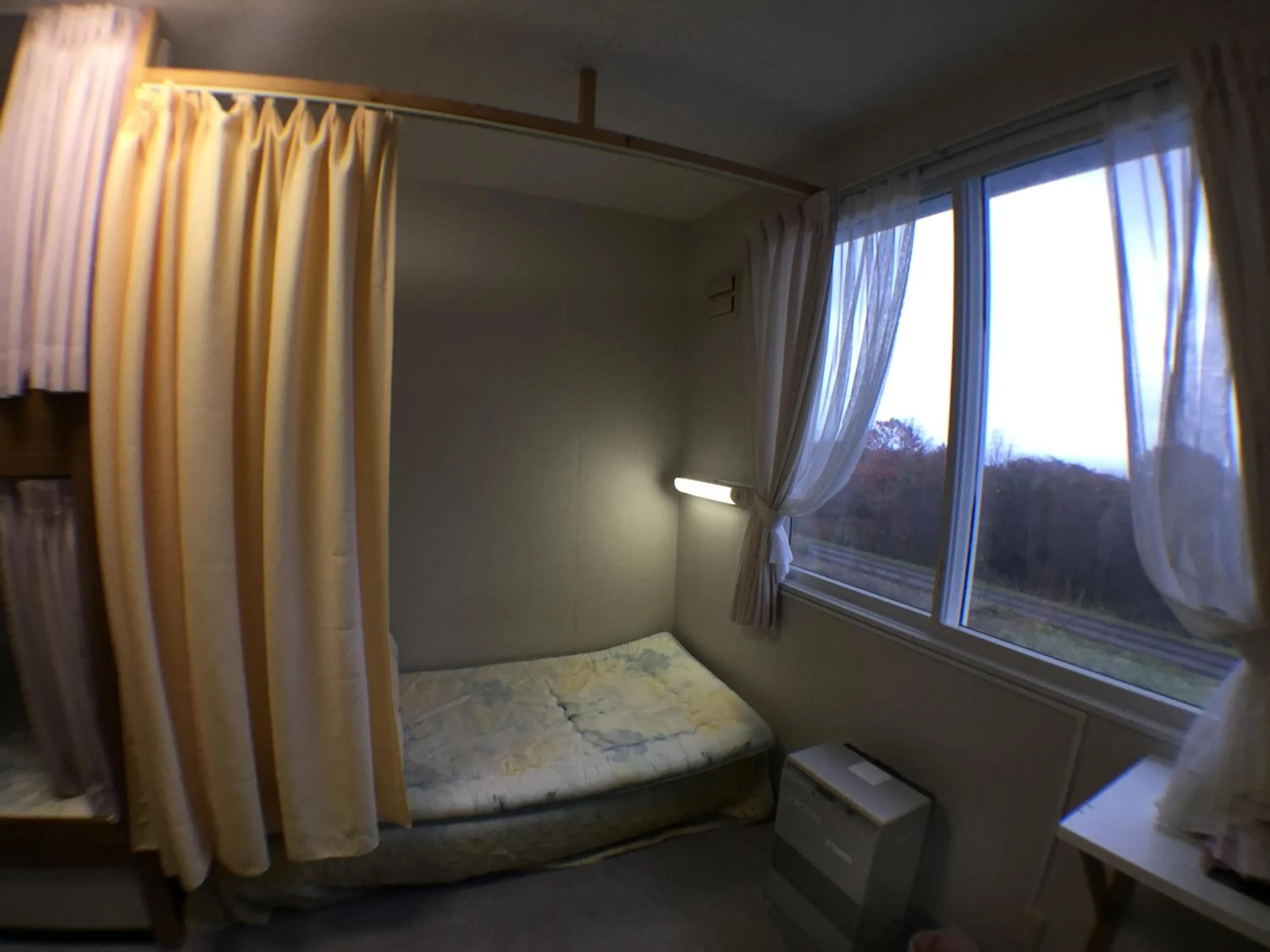 Bedroom, Bed in Abashiri Ryuhyou no Oka guesthouse