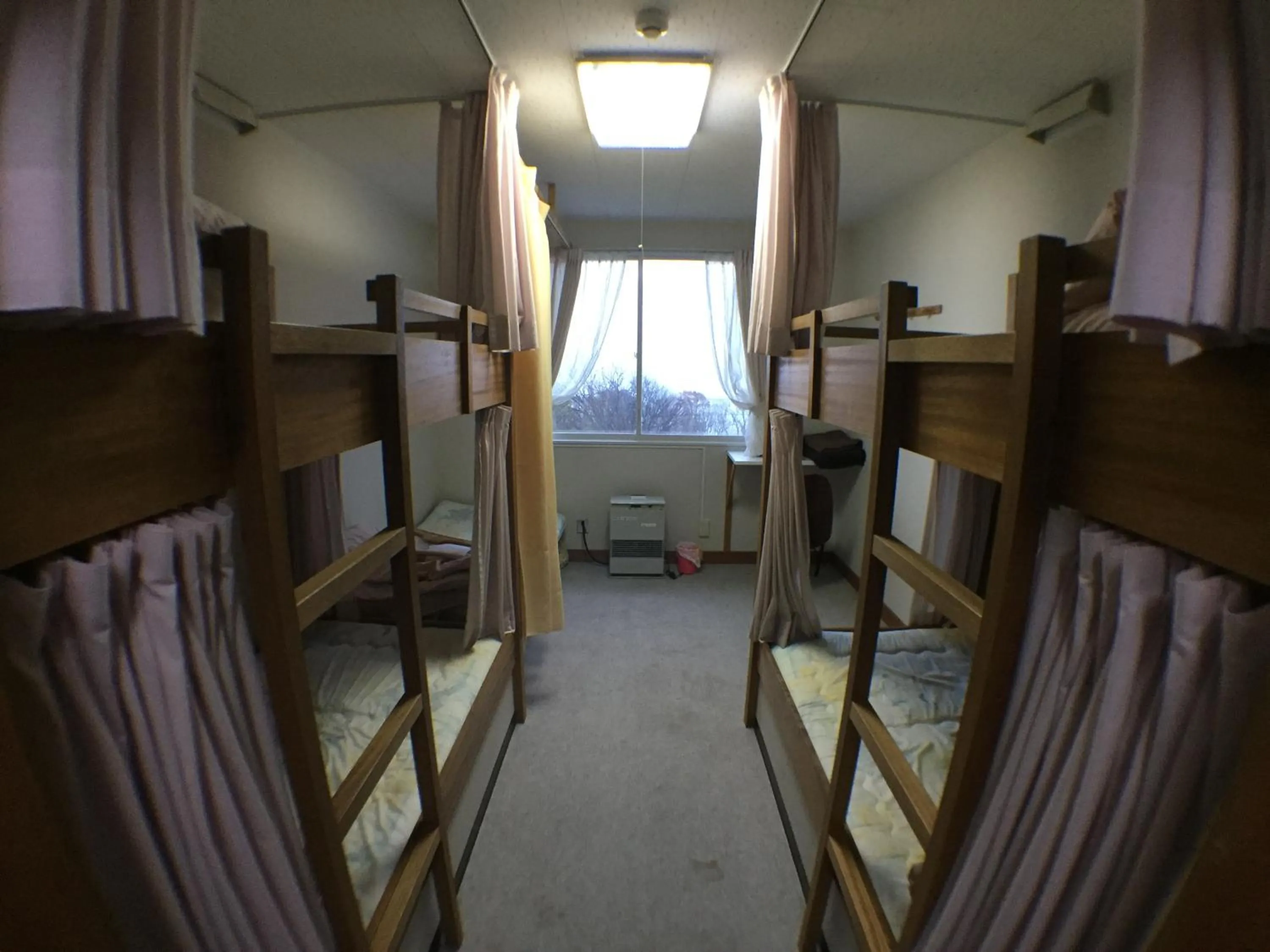 Bedroom, Bed in Abashiri Ryuhyou no Oka guesthouse