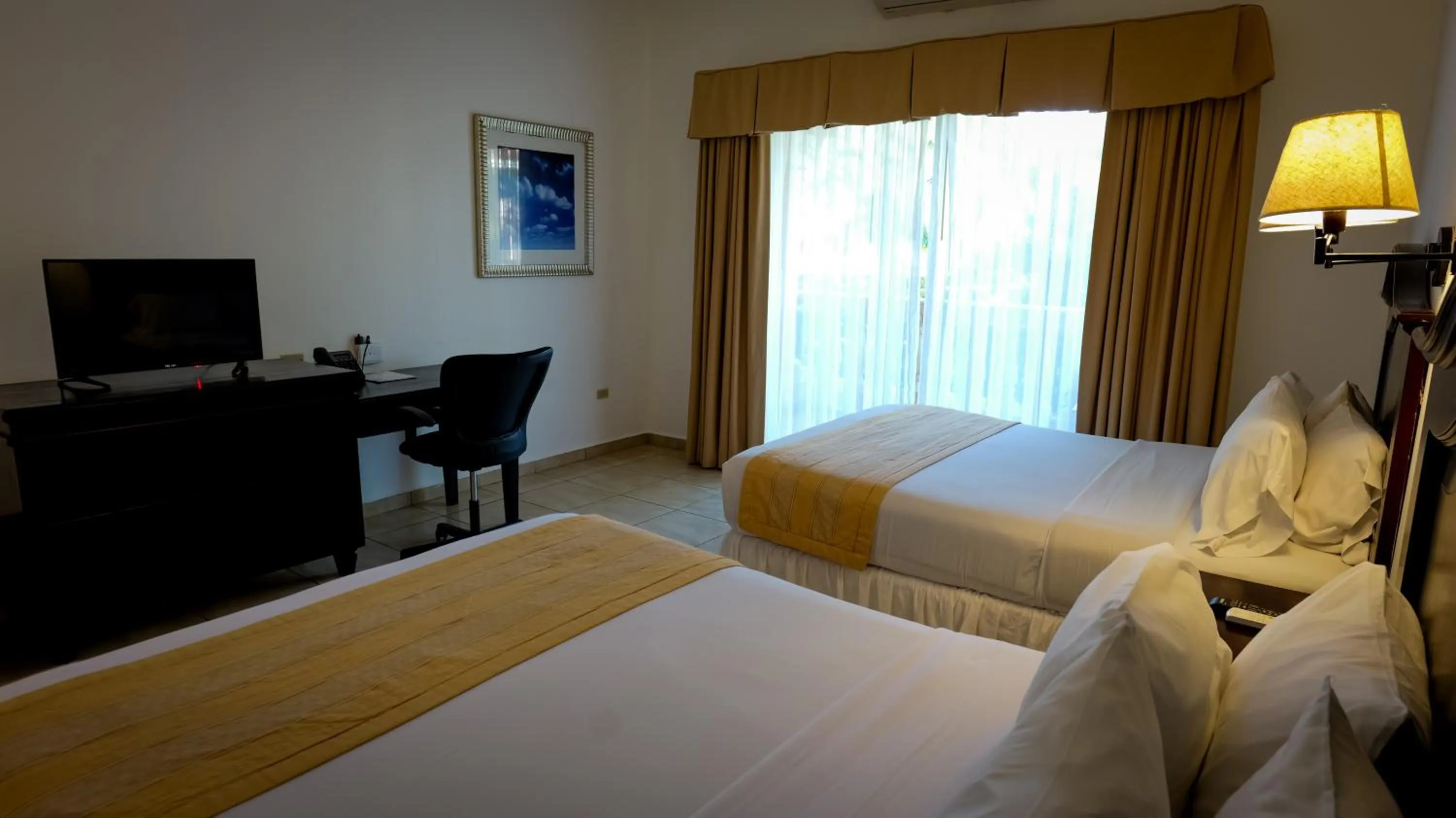 Bedroom, Bed in La Ensenada Beach Resort