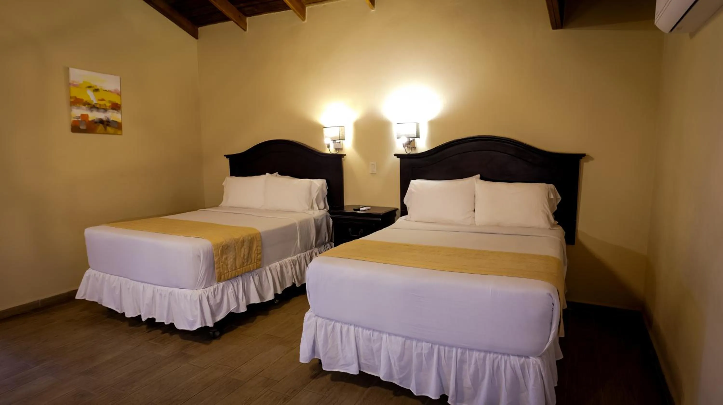 Photo of the whole room, Bed in La Ensenada Beach Resort