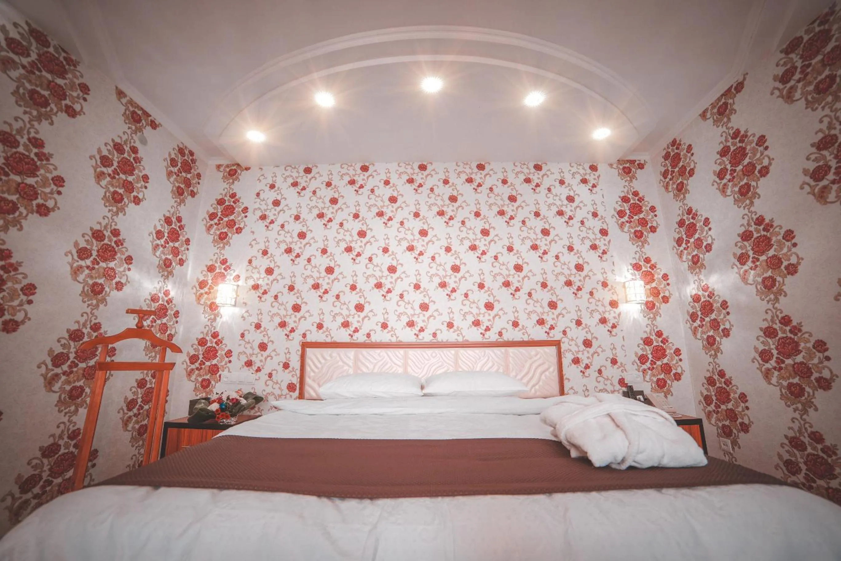 Bed in Asmald Palace Hotel