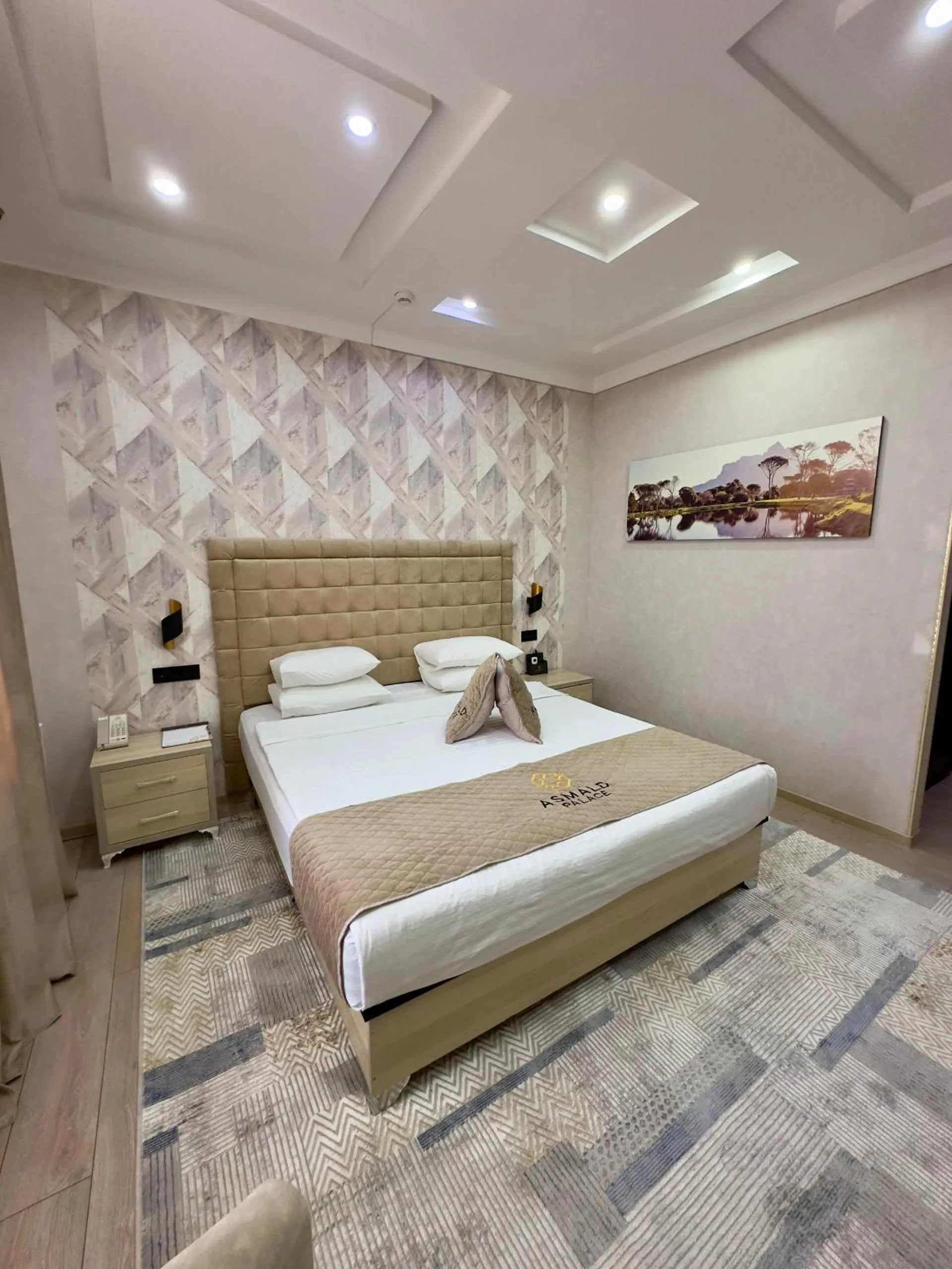 Bed in Asmald Palace Hotel