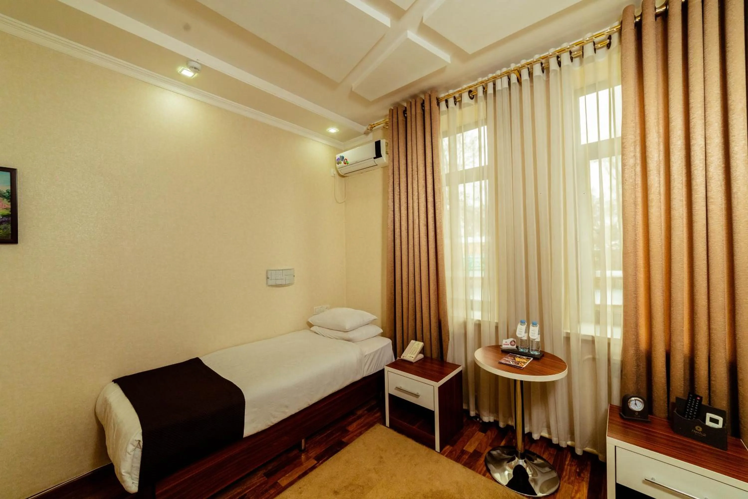 Bed in Asmald Palace Hotel