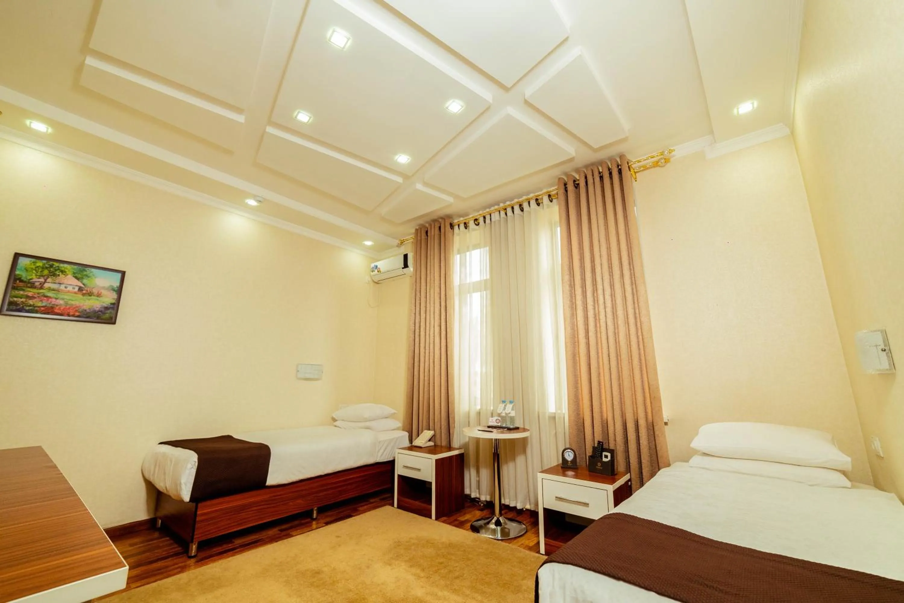 Bed in Asmald Palace Hotel