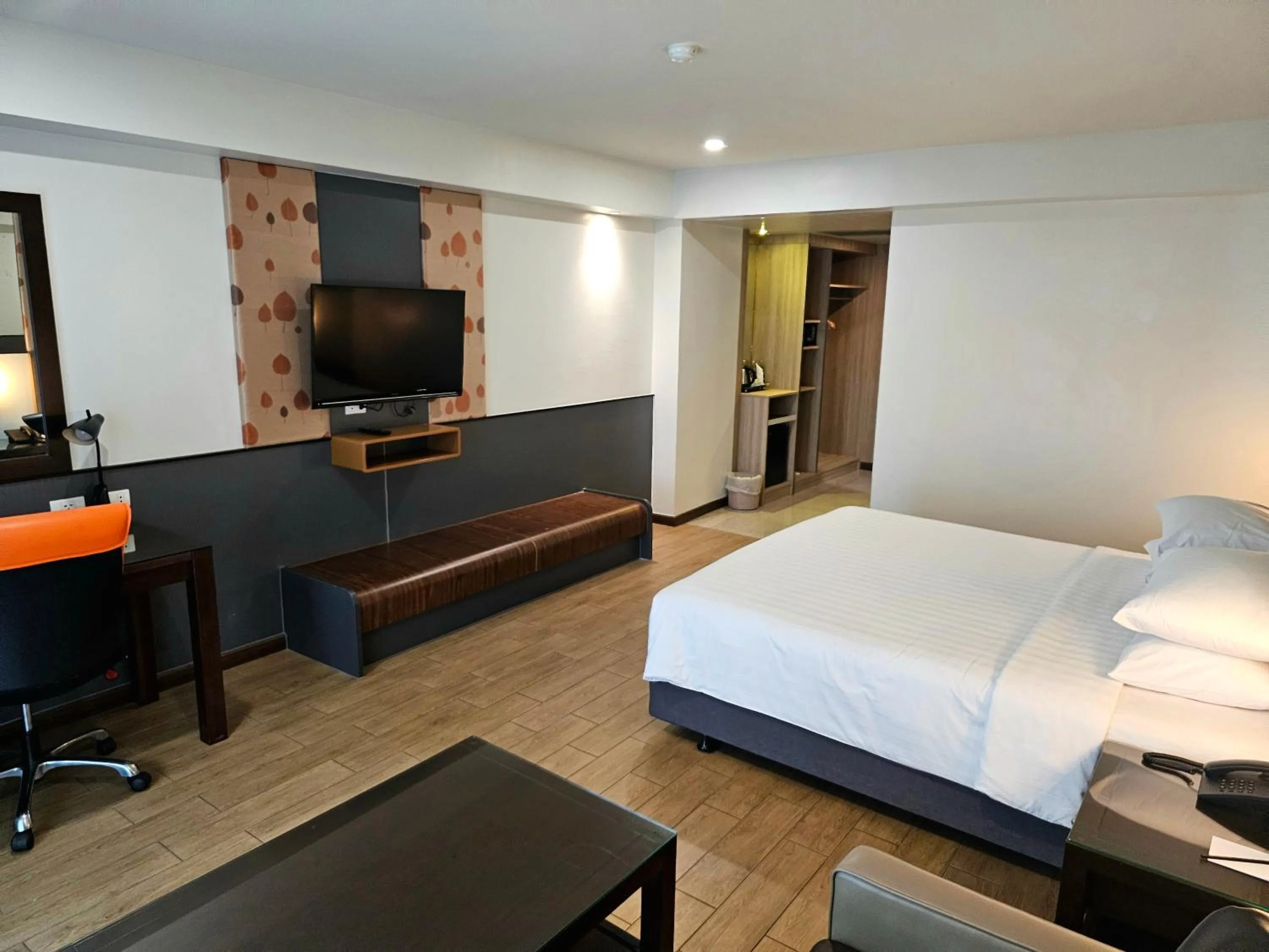 Bed in Dynasty Grande Hotel