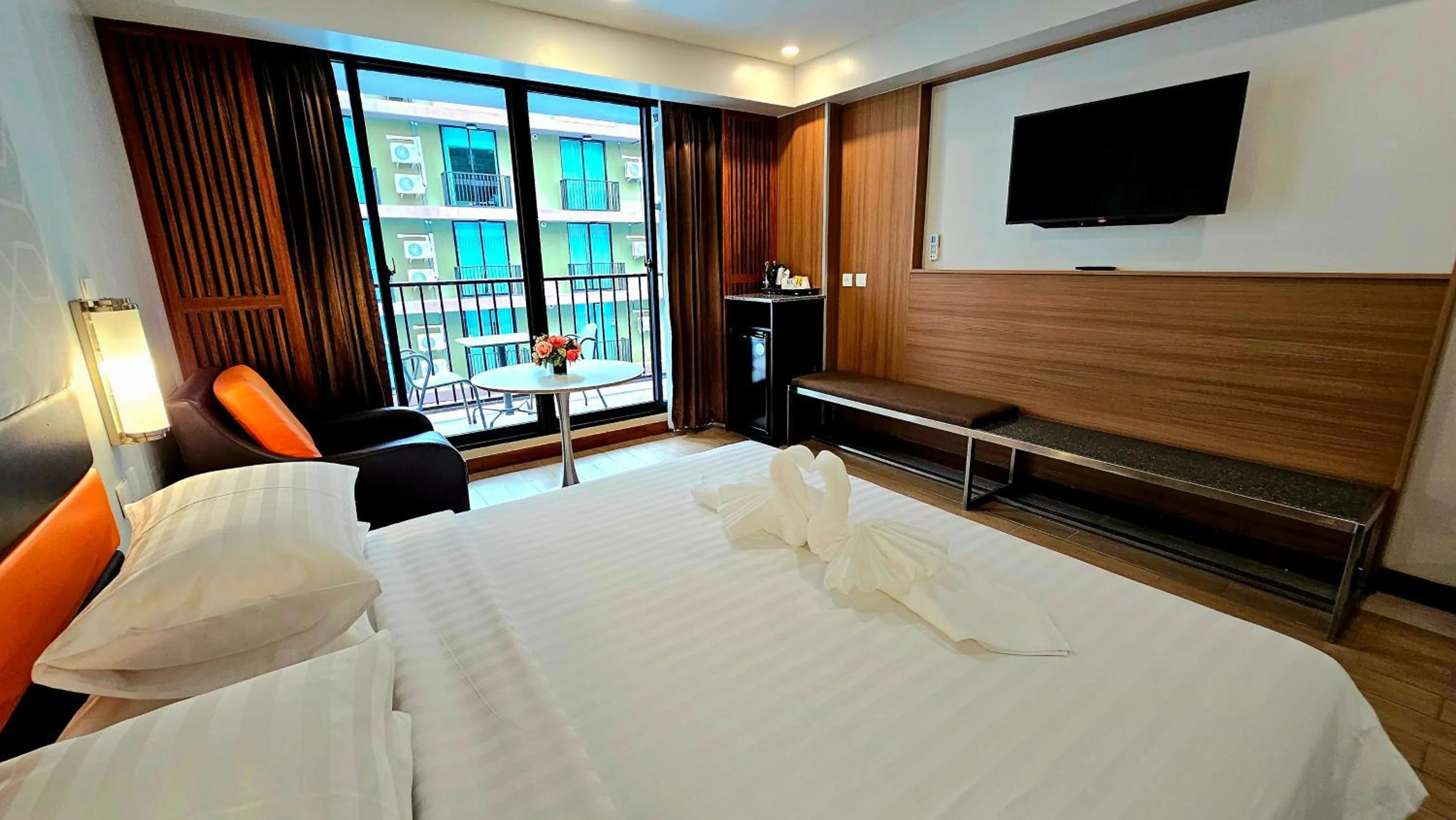 Bed in Dynasty Grande Hotel