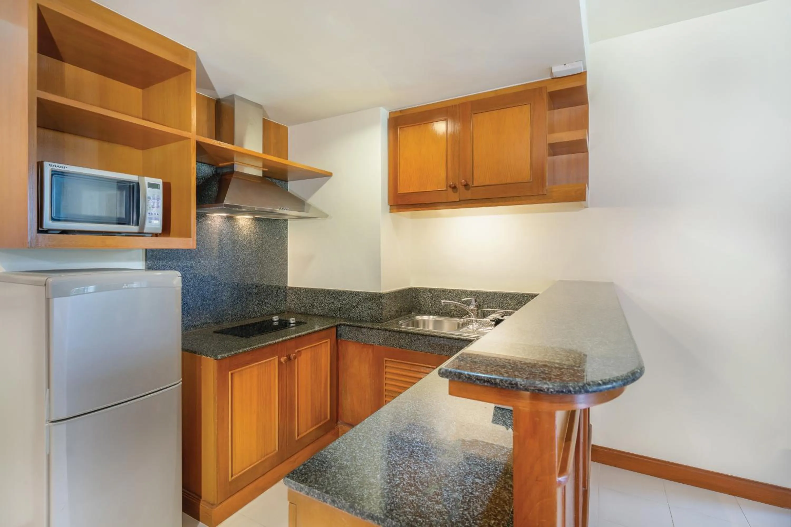 Kitchen or kitchenette in Homm Suites Laguna, part of Banyan Group