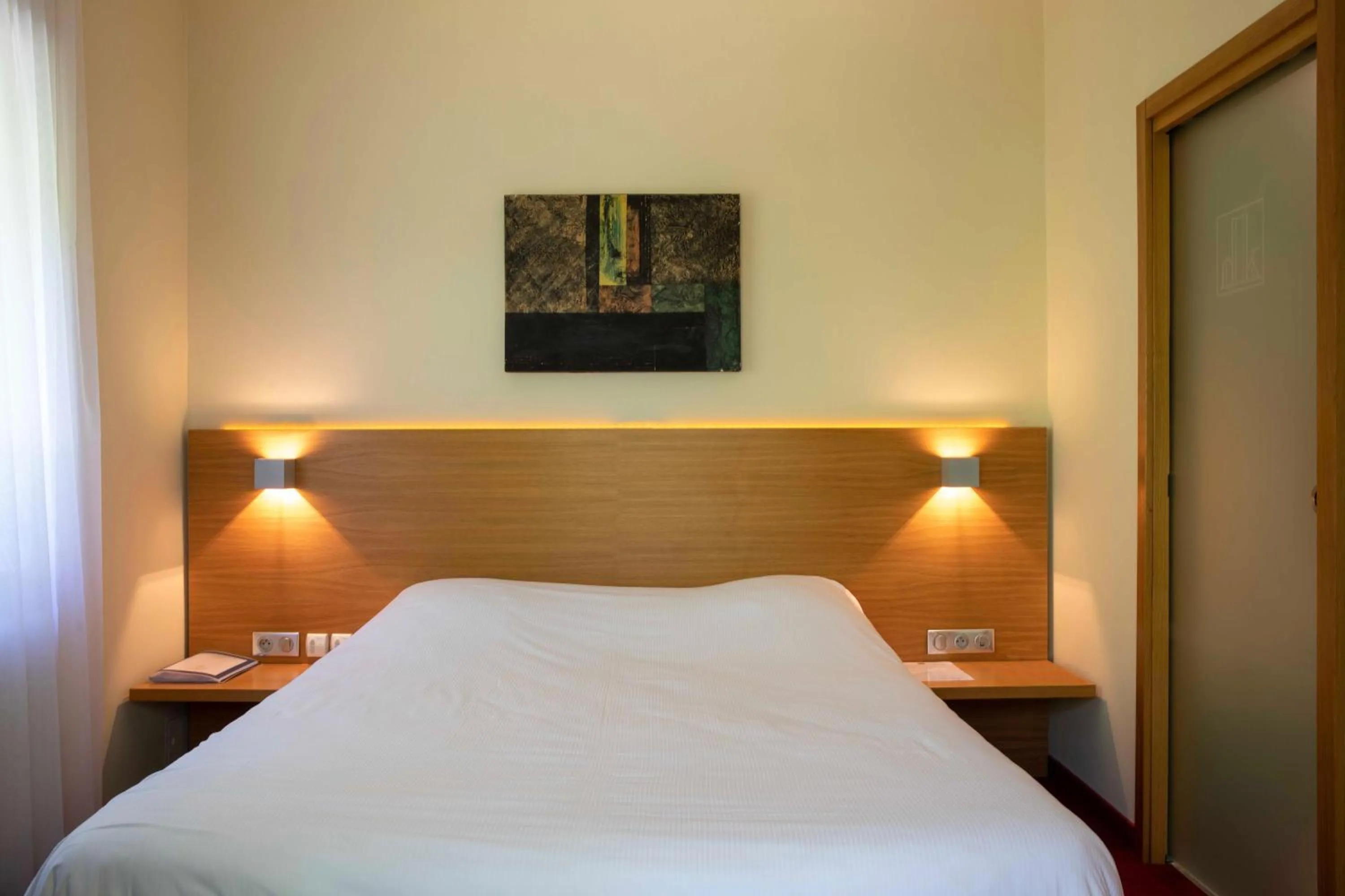 Bed in Hôtel Restaurant Logis Auberge Sundgovienne