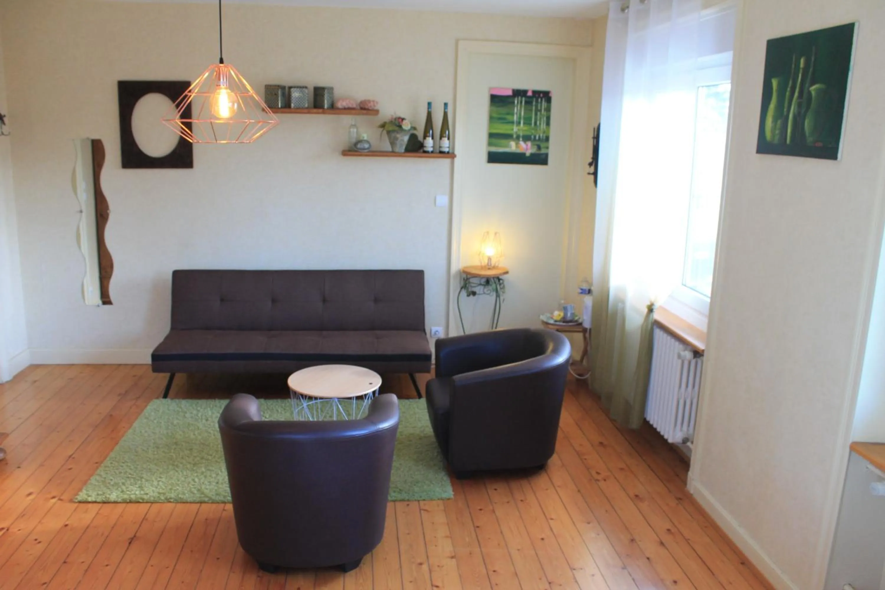 Seating area in Aux Berges de la Thur