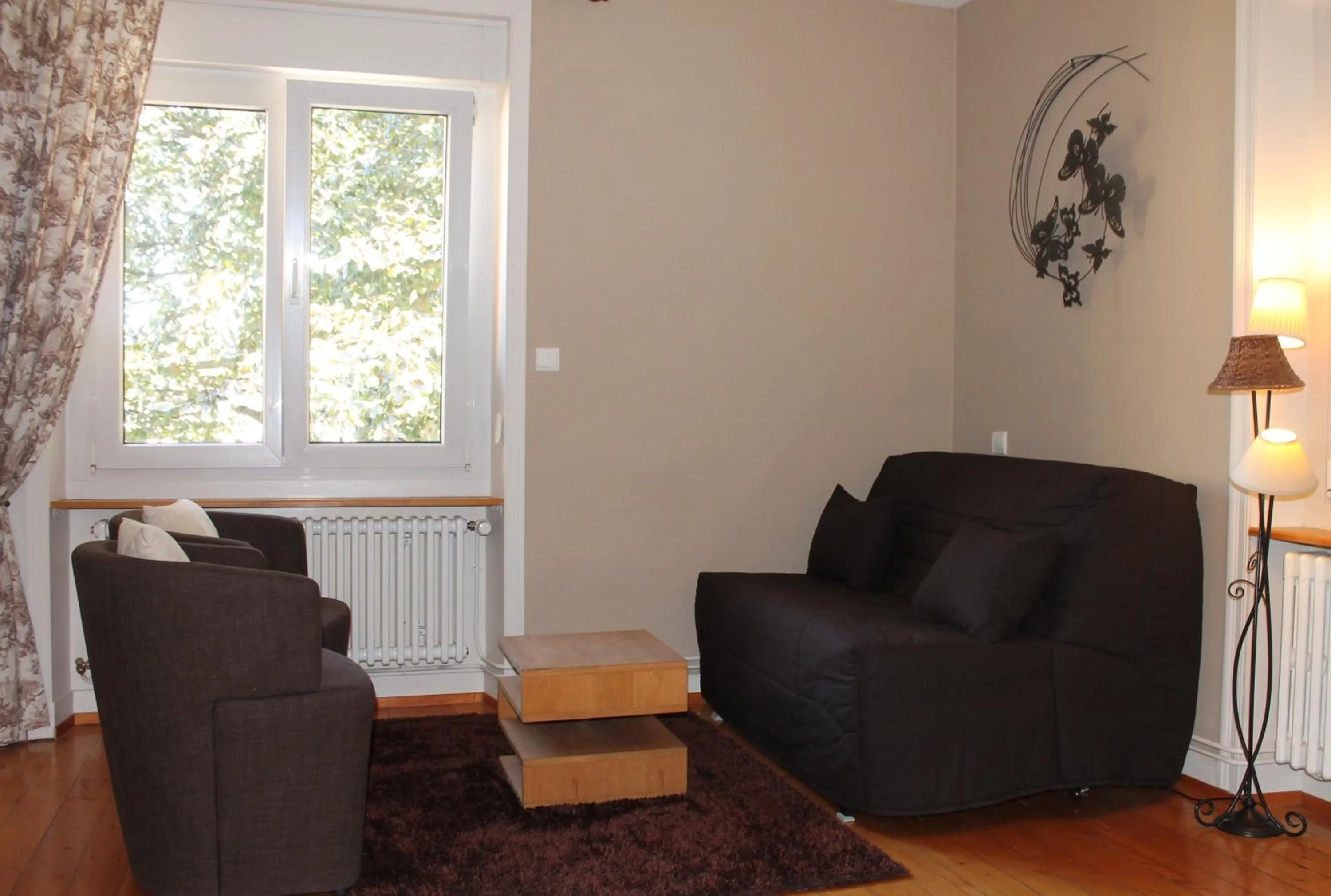 Seating area in Aux Berges de la Thur