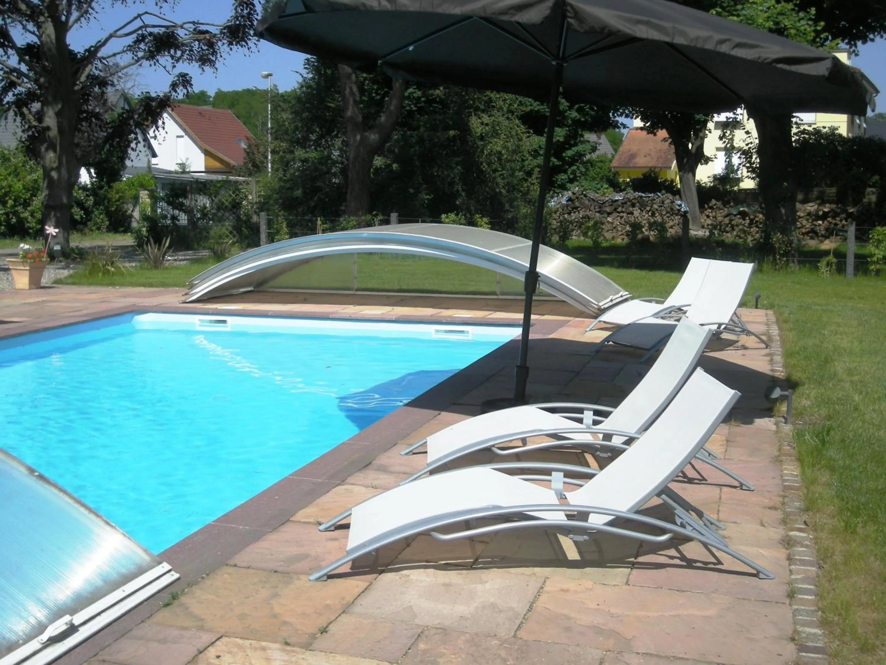 Swimming pool in Aux Berges de la Thur
