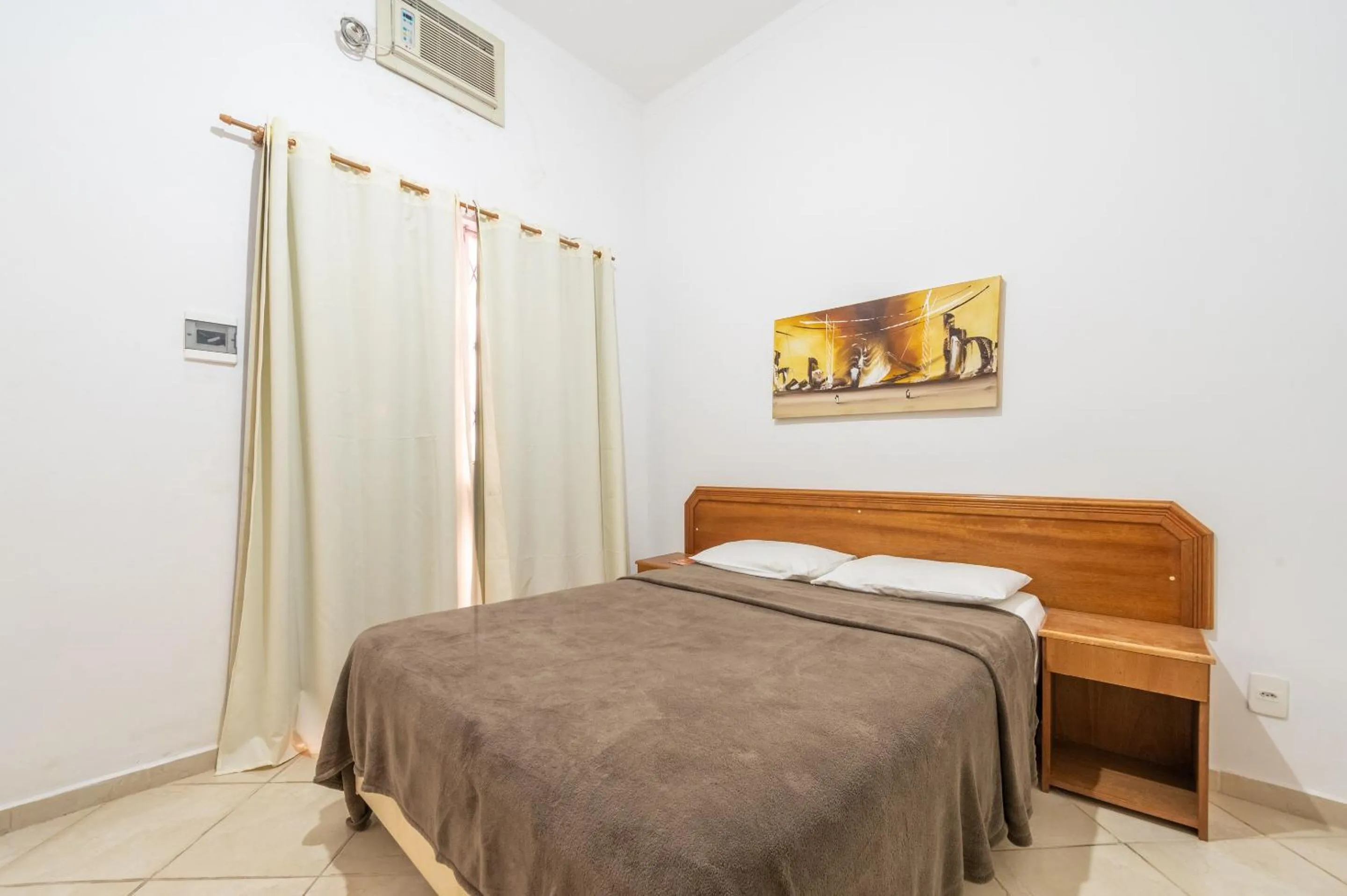 Bedroom, Bed in OYO Residencial Itacuruçá Apart Hotel, Mangaratiba