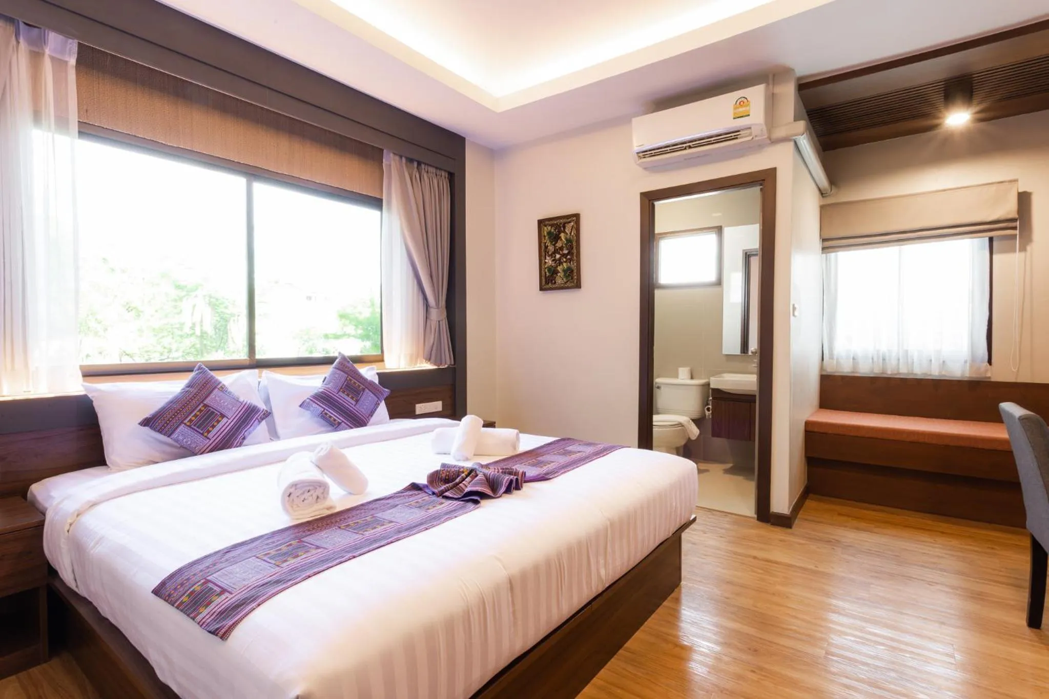 Bed in Lima Lanna Hotel