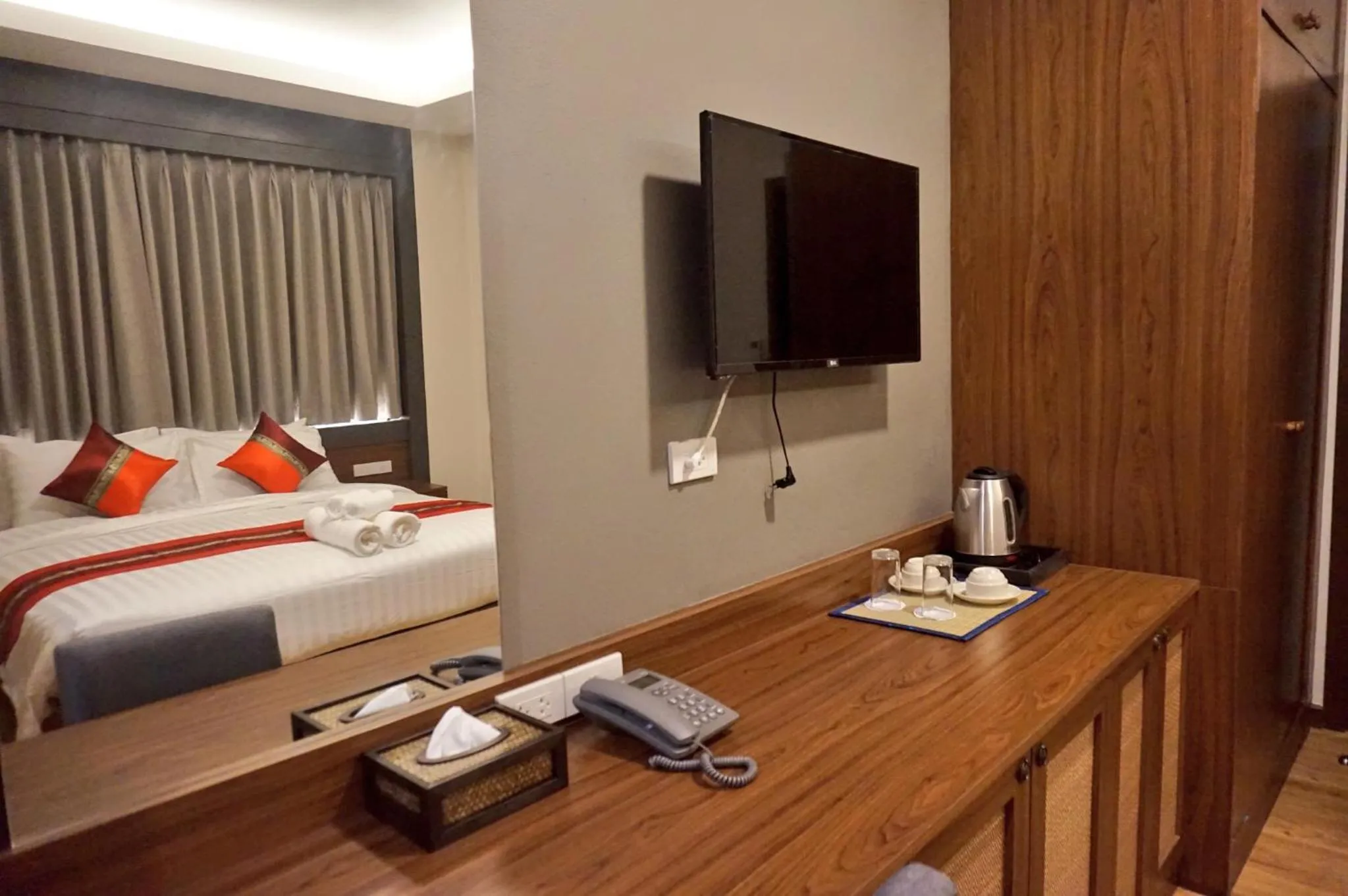 Bed in Lima Lanna Hotel