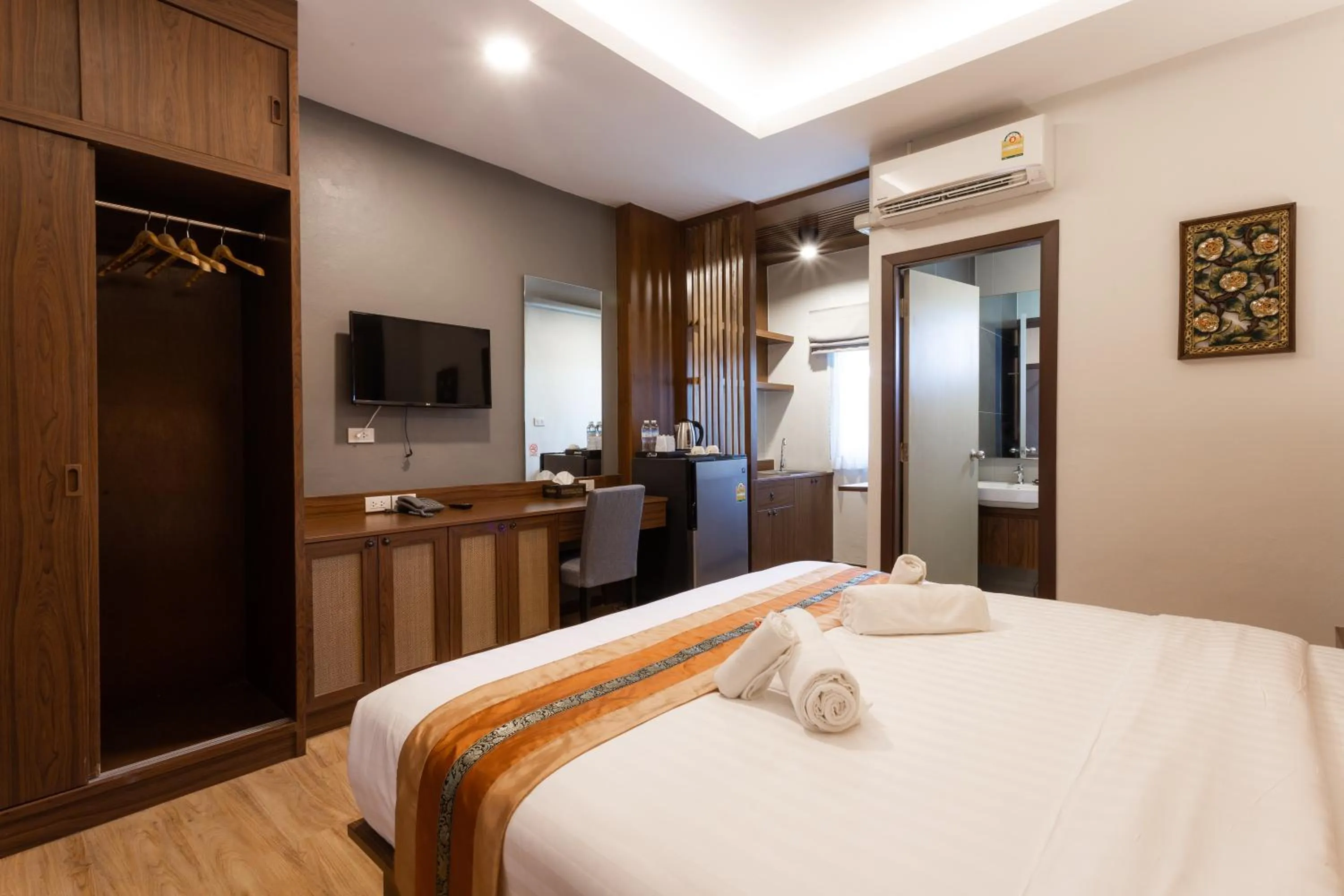 Bed in Lima Lanna Hotel